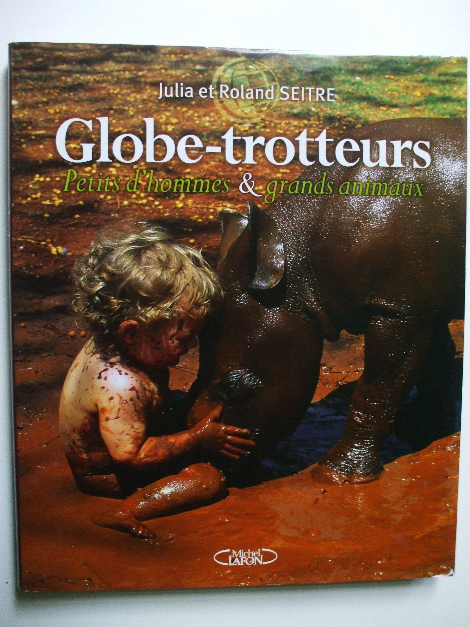 Globe-trotteurs petits d'hommes et grands animaux book