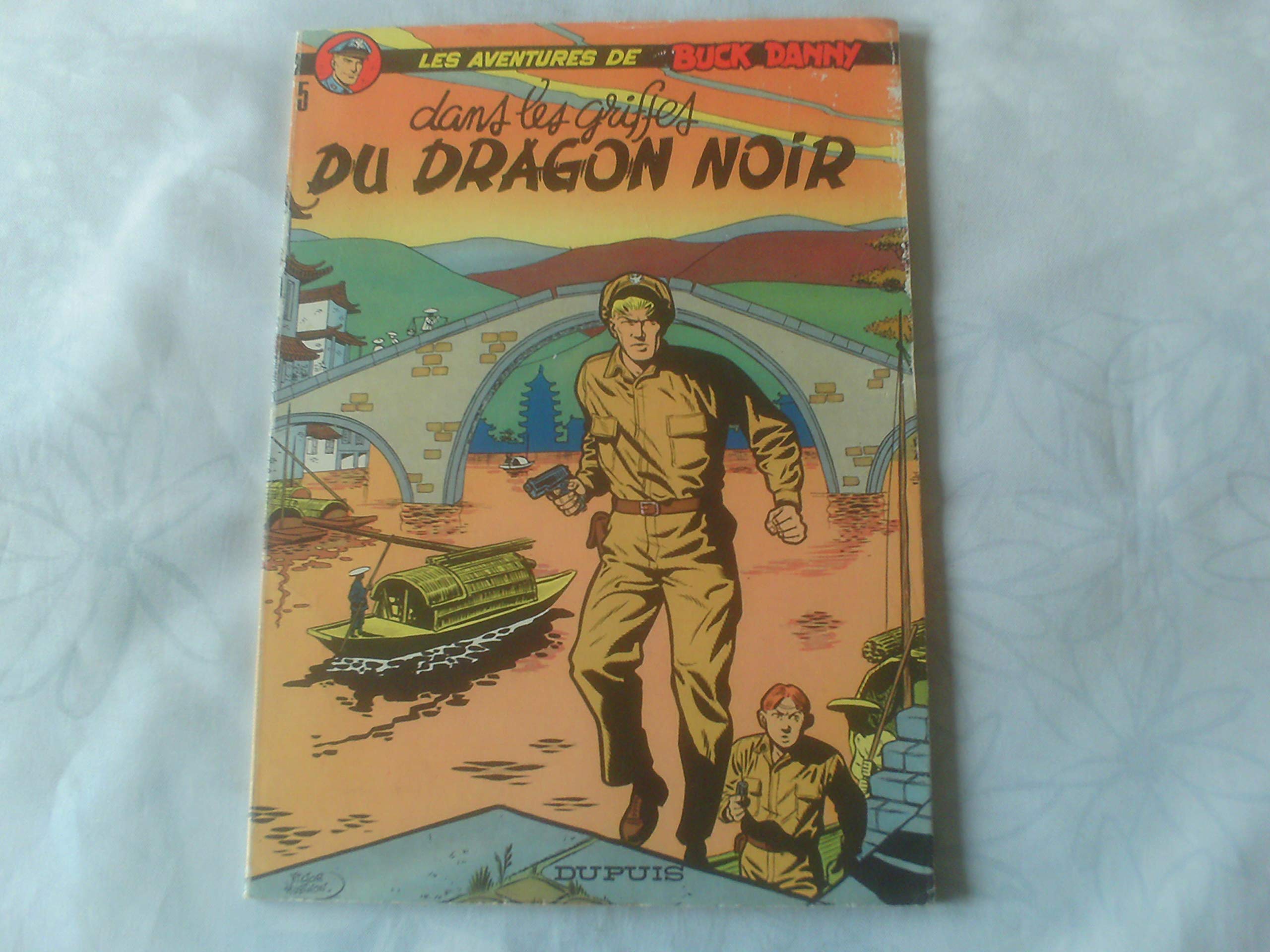 Dans Les Griftes Du Dragon Noir (Les Aventures De Buck Danny 5) Books