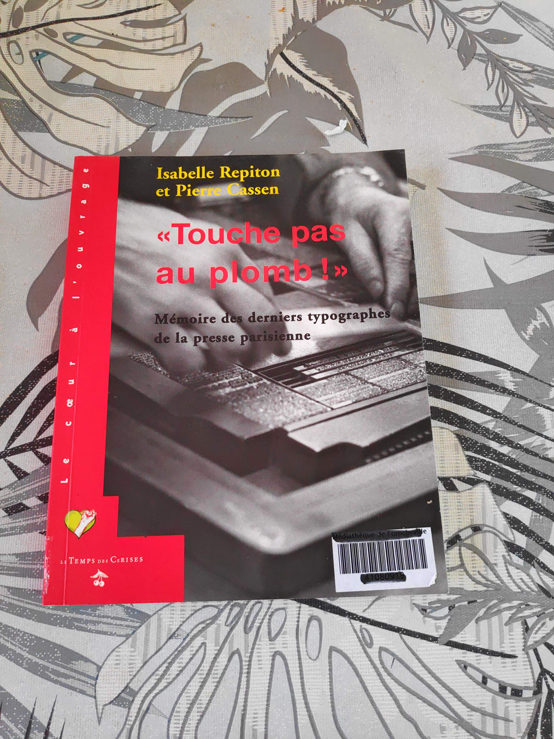 Touche pas au plomb !: Mémoire des derniers typographes de la presse parisienne book