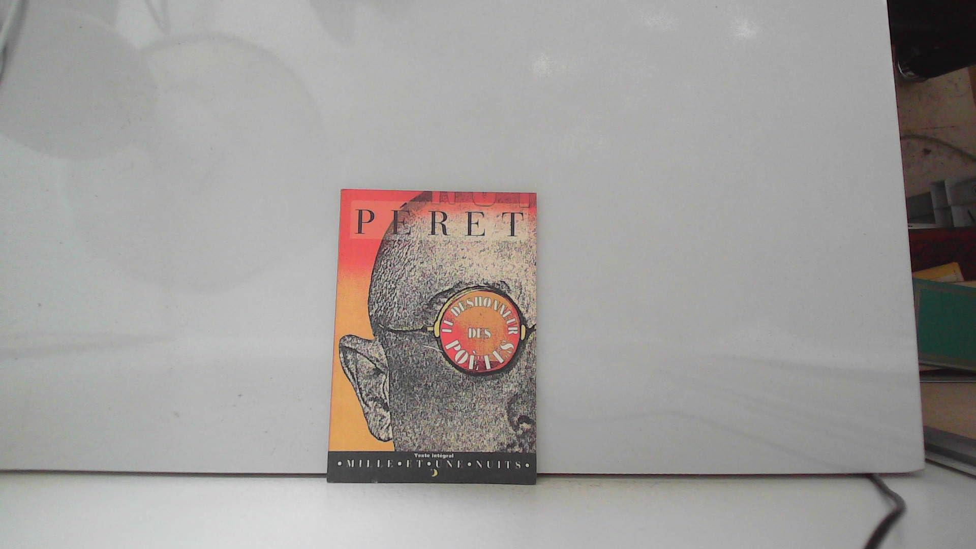 Le déshonneur des poètes. suivi de La parole est à Péret book