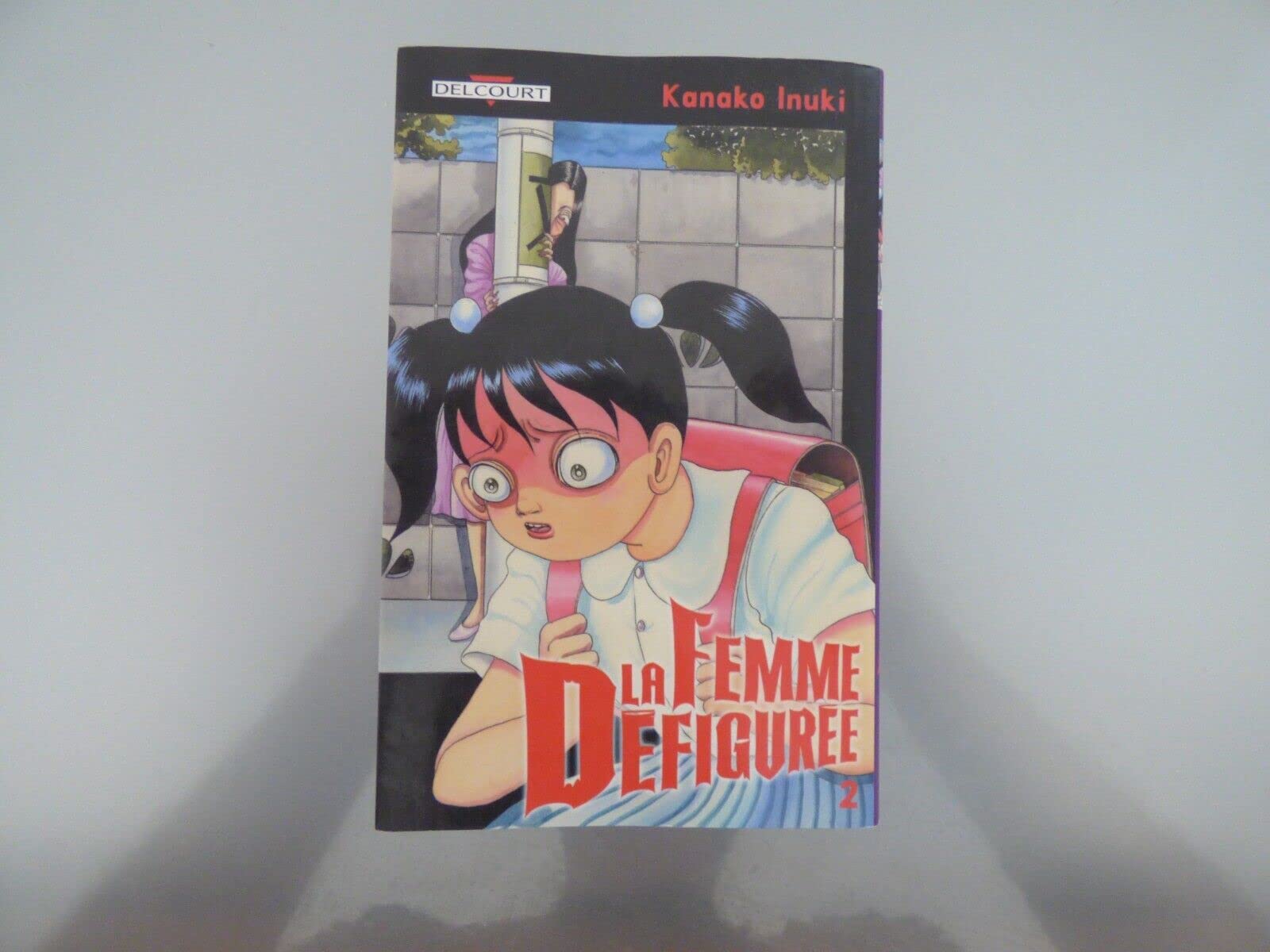 La Femme défigurée, Tome 2 : Manga