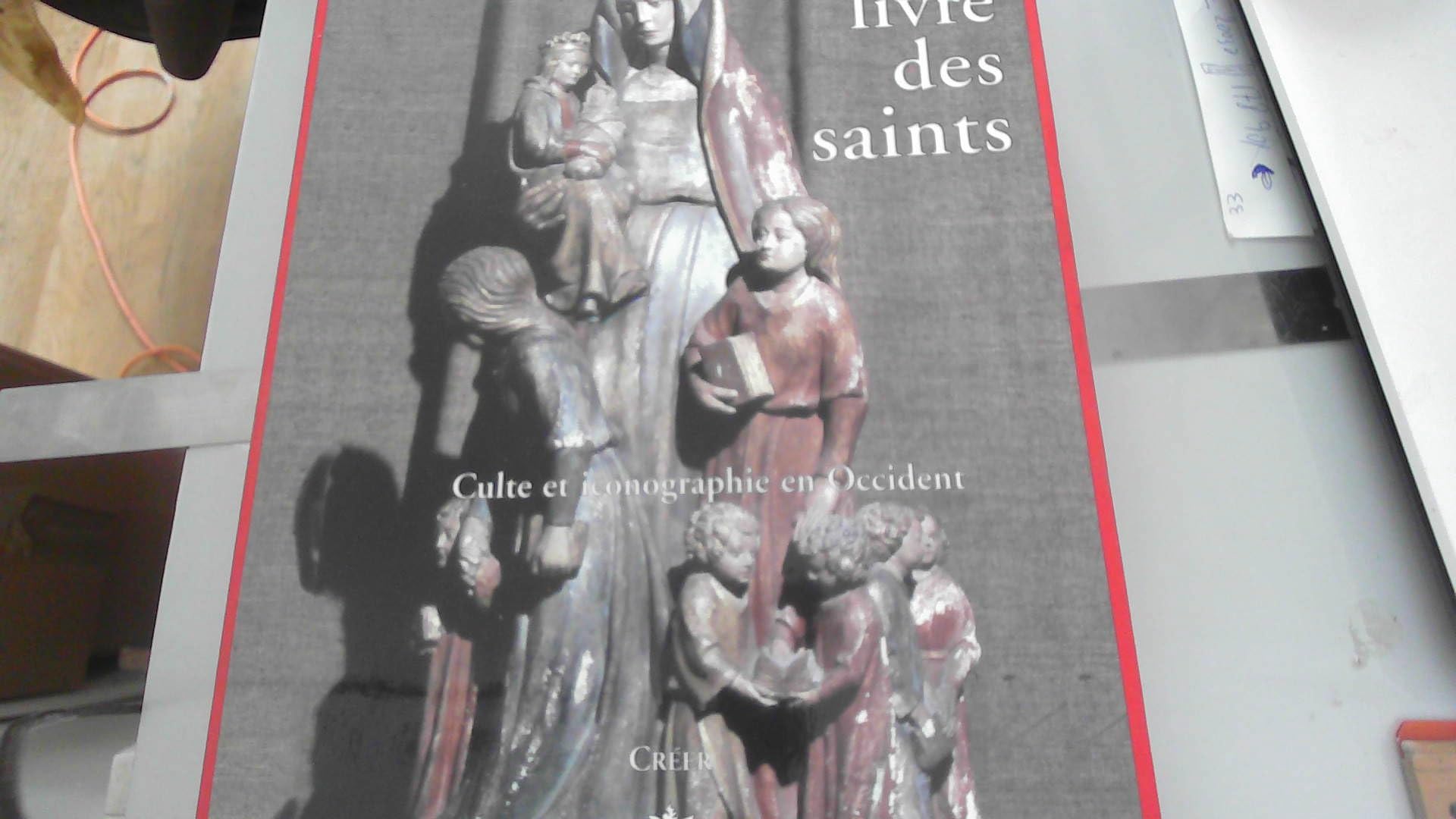 Grand livre des saints: Culte et iconographie en Occident book