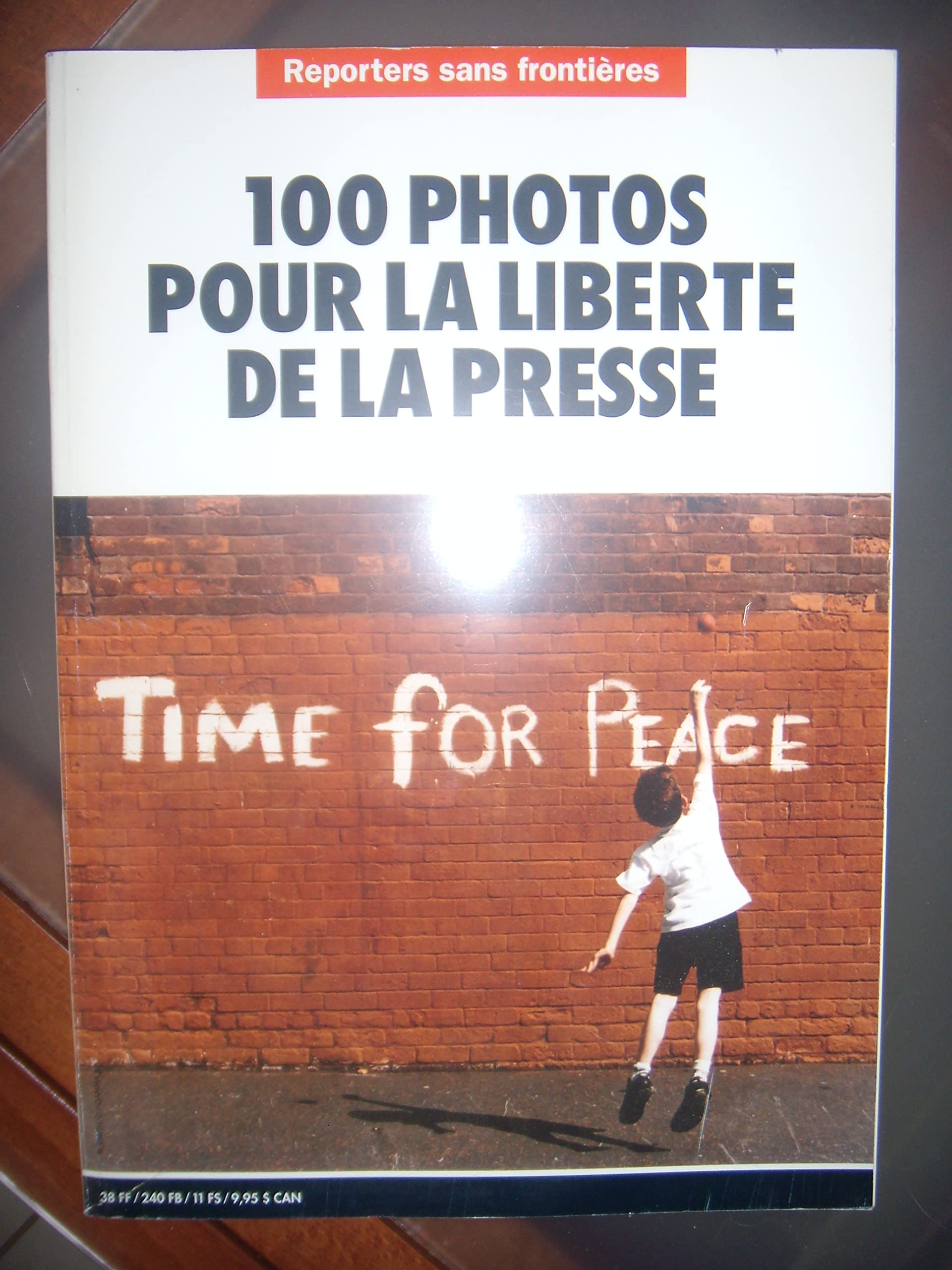 100 PHOTOS POUR LA LIBERTE DE LA PRESSE - TIME FOR PEACE. book
