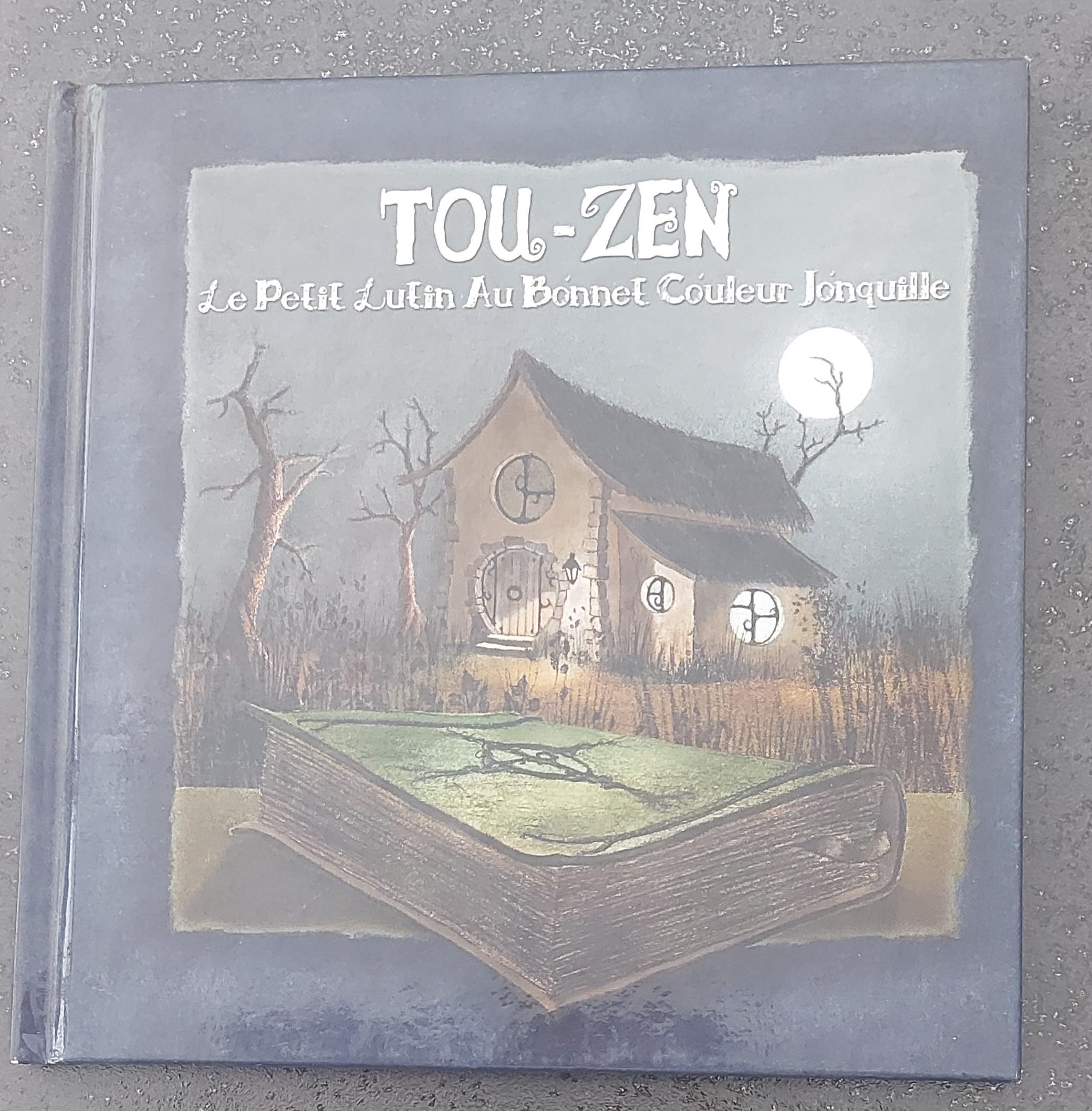 Tou-Zen : Le petit lutin au bonnet couleur jonquille book