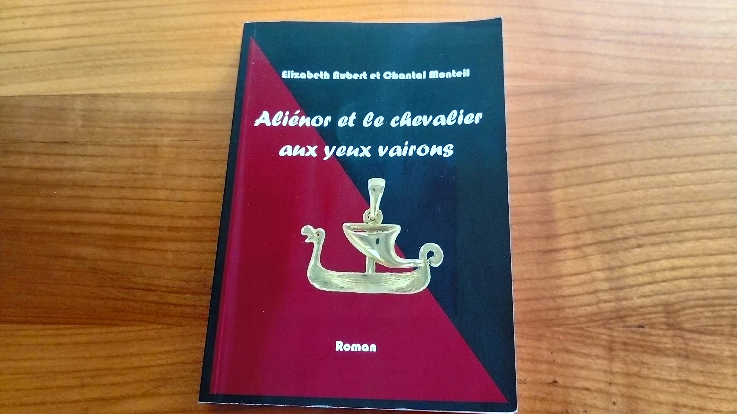 Aliénor et le chevalier aux yeux vairons book