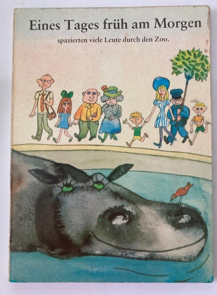 Eines Tages früh am Morgen spazierten viele Leute durch den Zoo. Books