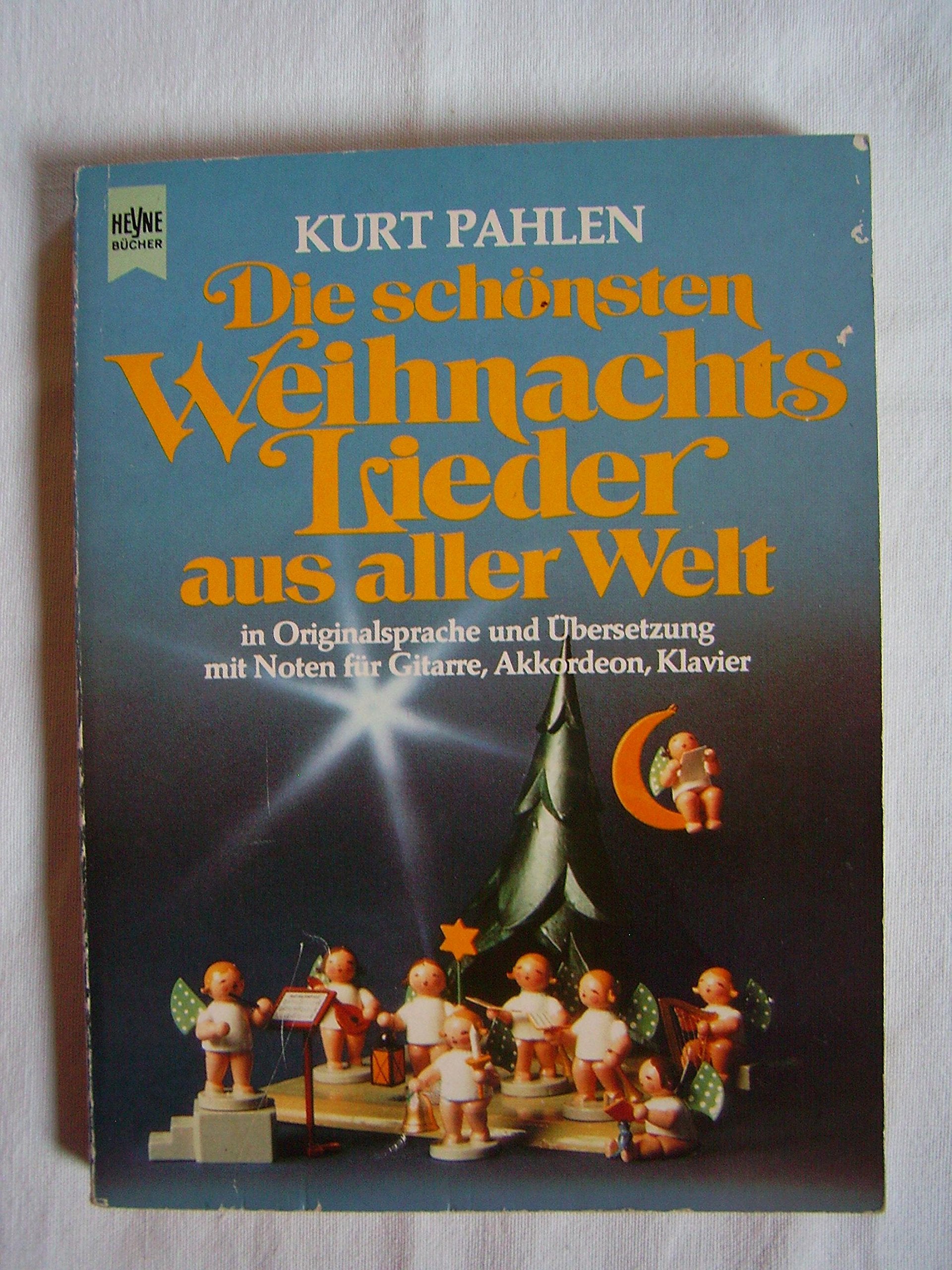 Die schönsten Weihnachtslieder aus aller Welt. In Originalsprache und Übersetzung mit Noten für Gitarre, Akkordeon, Klavier Sheet Music