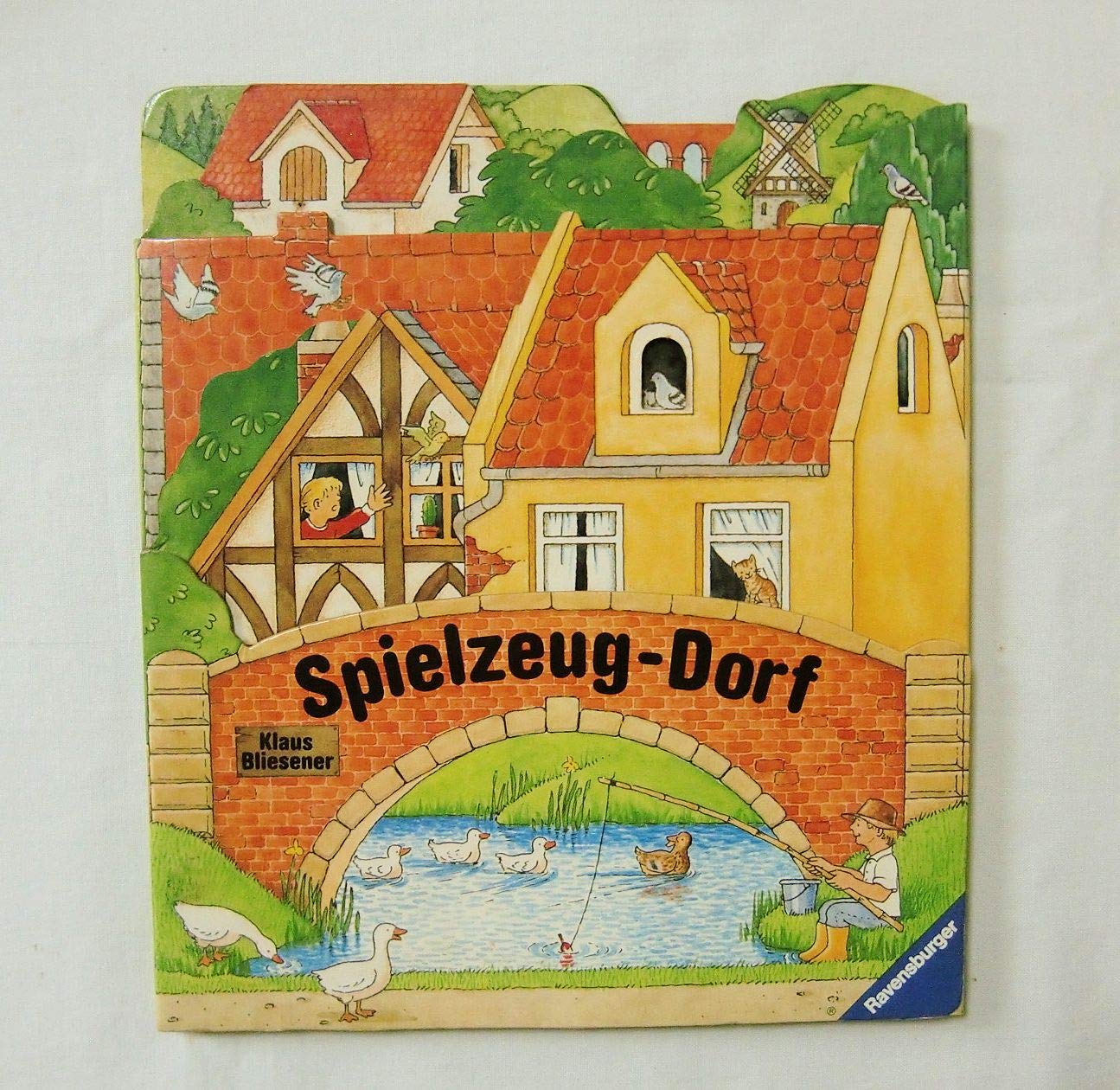 Spielzeug-Dorf: Bilderbuch mit Gucklöchern Books