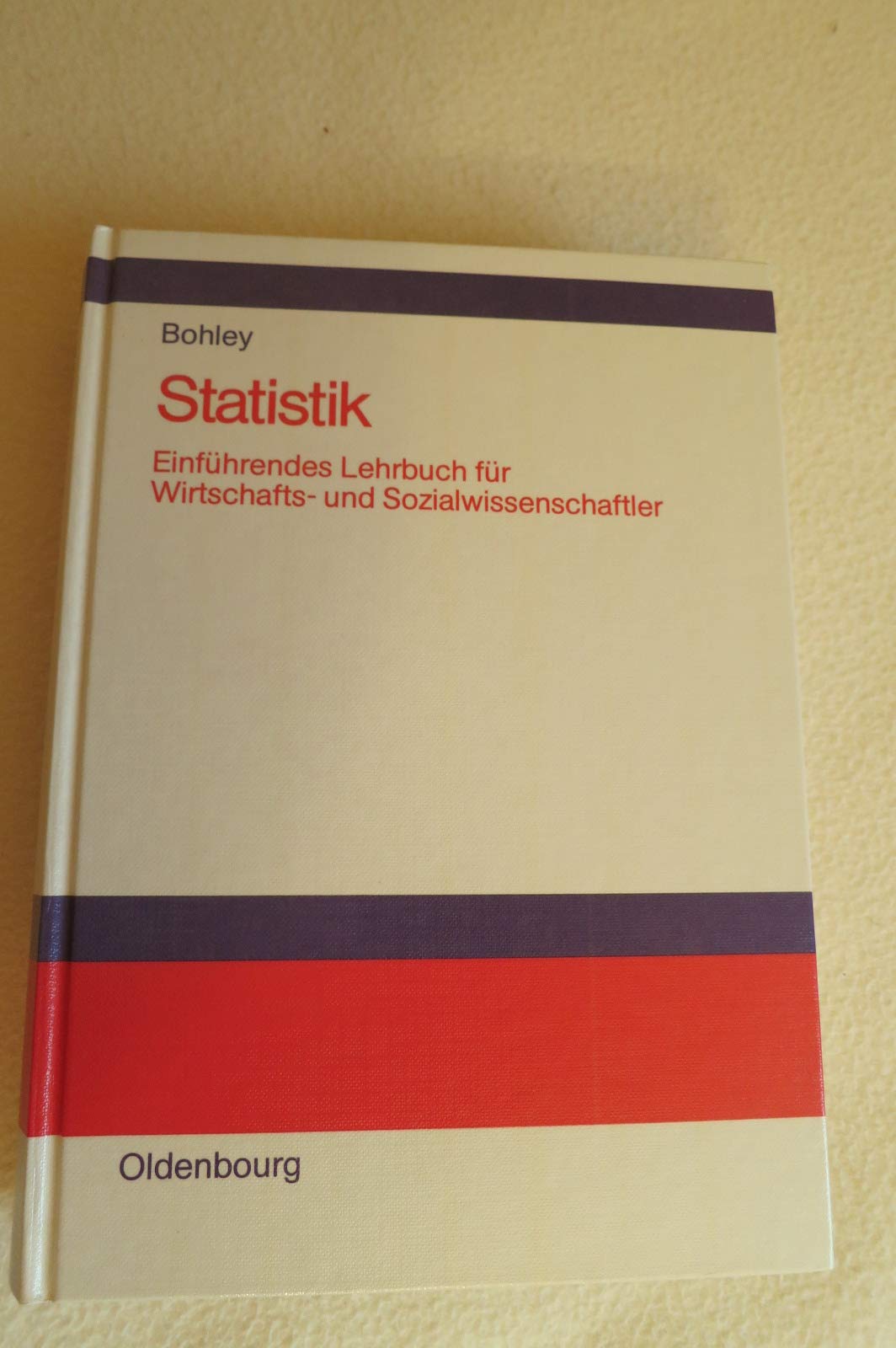 Statistik : einf. Lehrbuch für Wirtschafts- u. Sozialwissenschaftler. Books