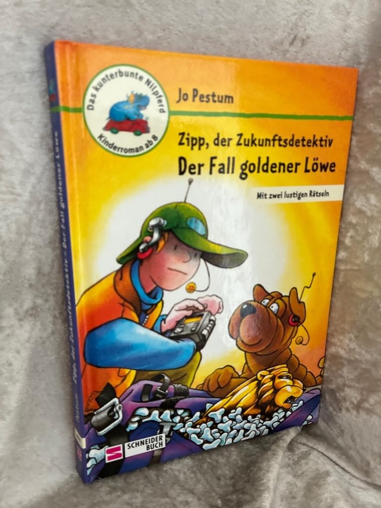 Zipp, der Zukunftsdetektiv - Der Fall goldener Löwe: Mit zwei lustigen Rätseln (Das kunterbunte Nilpferd) Novels & Short Stories
