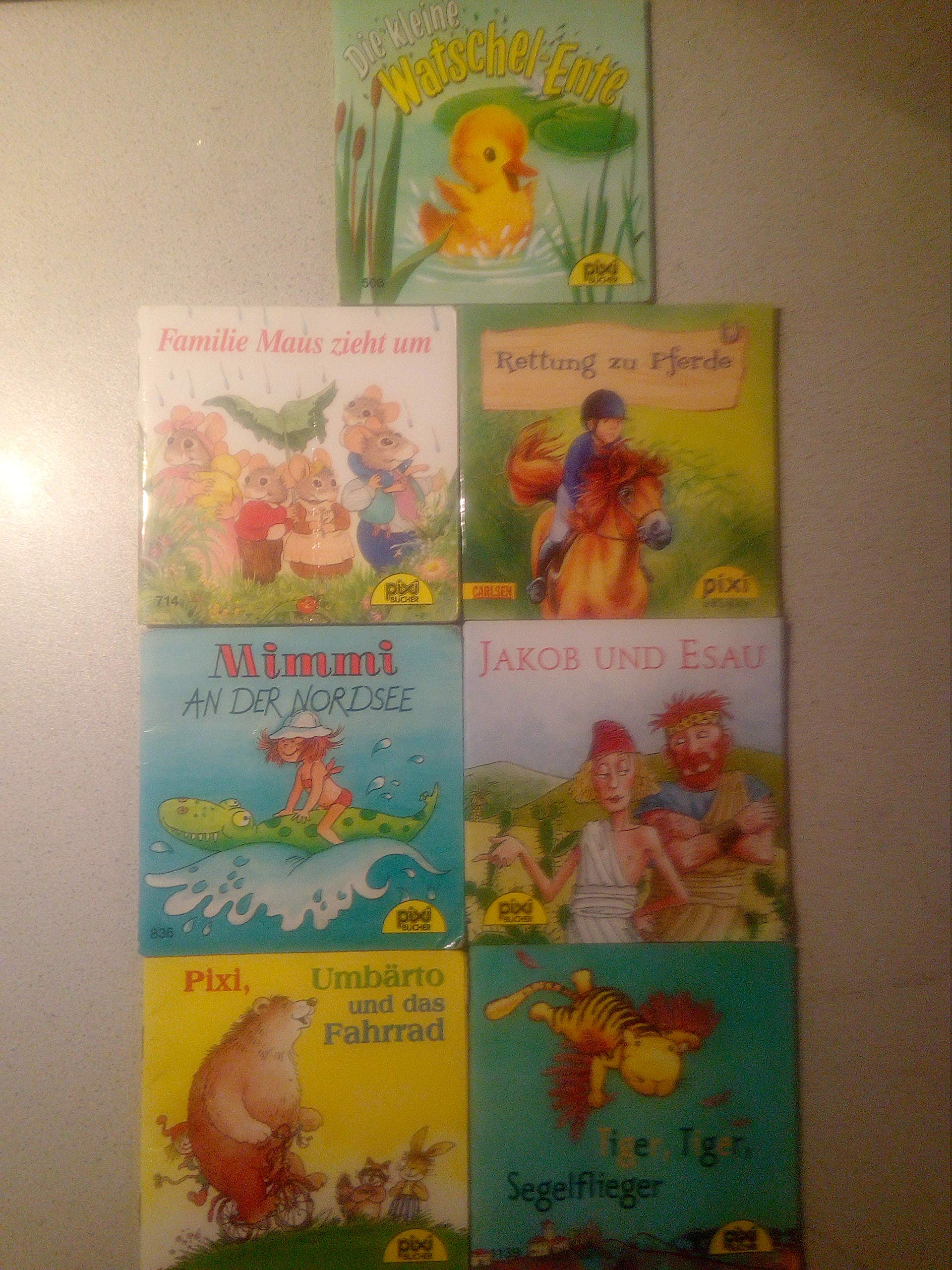 7 Pixi Bücher(Die kleine Watschelente,Rettung zu Pferde,Familie Maus zieht um,Mimmi an der Nordsee,Umbärto und das Fahrrad,Tiger,Tiger,Segelflieger,Jakob und Esau) Children's books