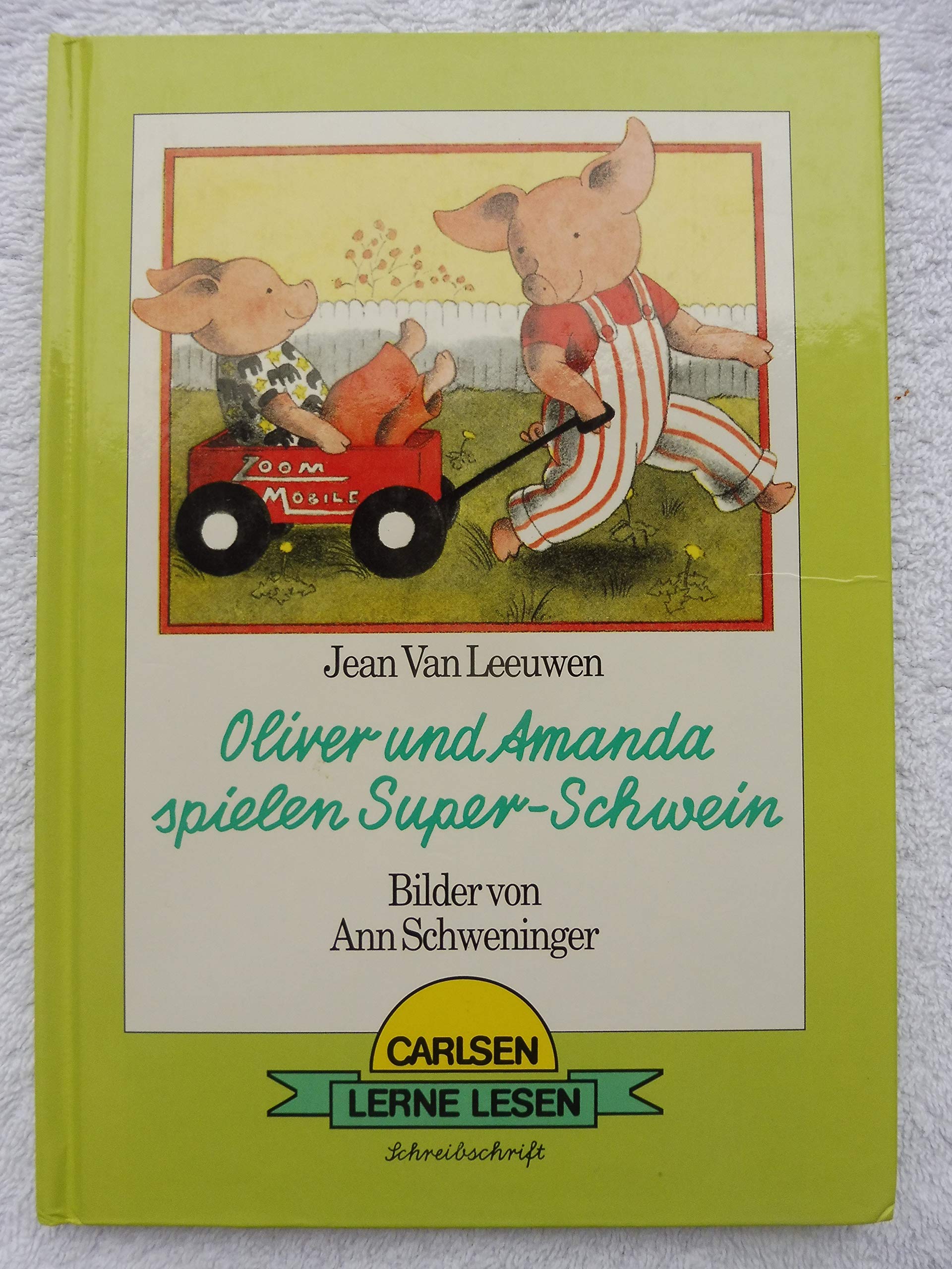 Oliver und Amanda spielen Super-Schwein. Schreibschrift Books