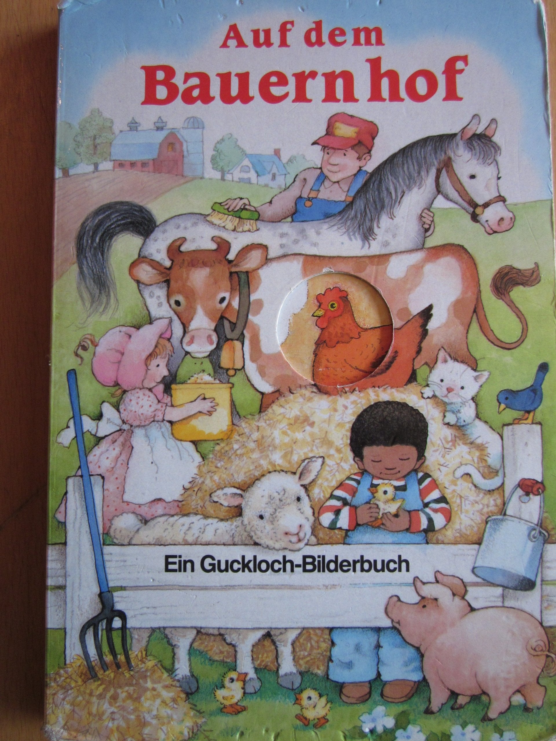Auf dem Bauernhof - Ein Guckloch-Bilderbuch Books