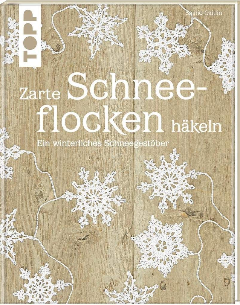 Zarte Schneeflocken häkeln book