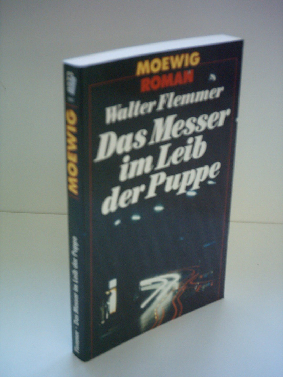 Das Messer im Leib der Puppe. Roman. Books