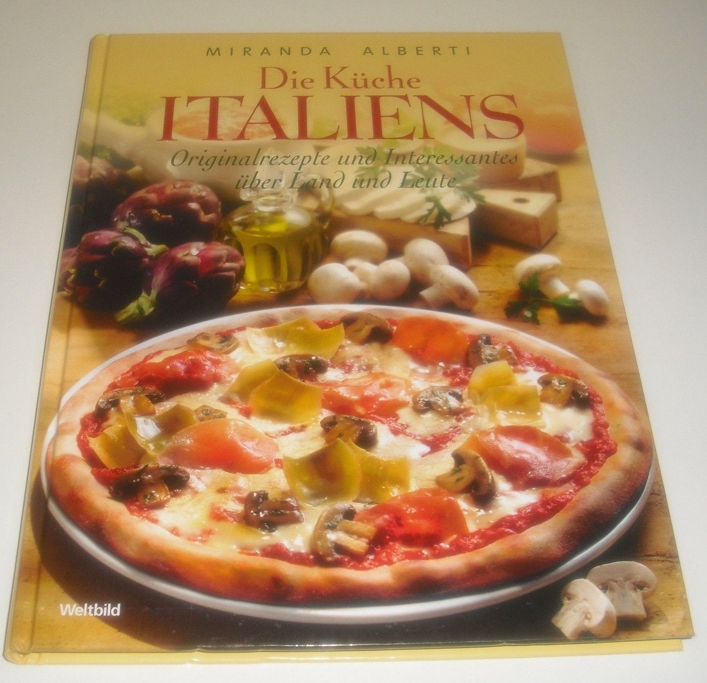Die Küche Italiens. Originalrezepte und Interessantes über Land und Leute. Books