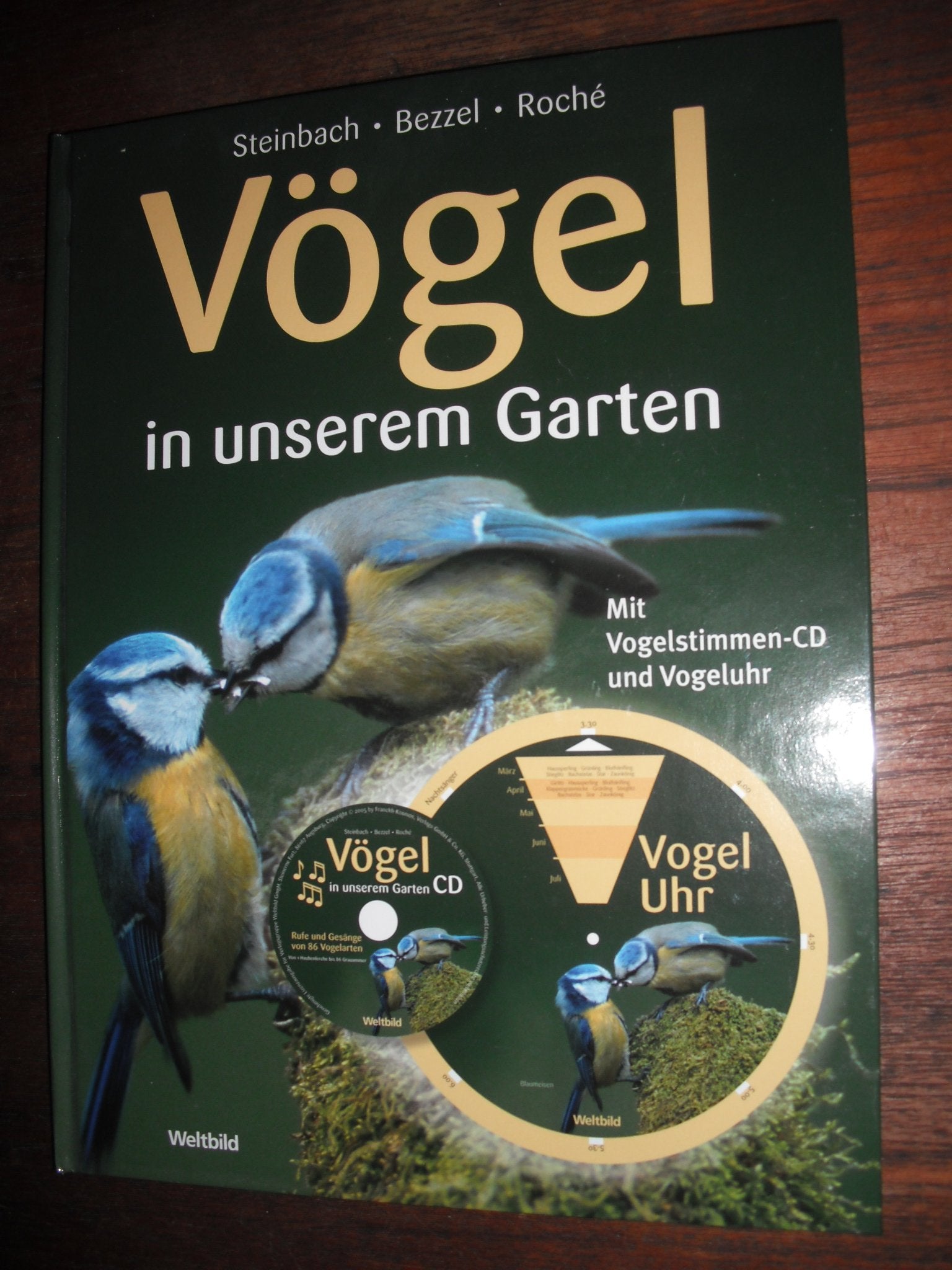 Vögel (in unserem Garten (mit Vogelstimmen -Cd und Vogeluhr)) Books