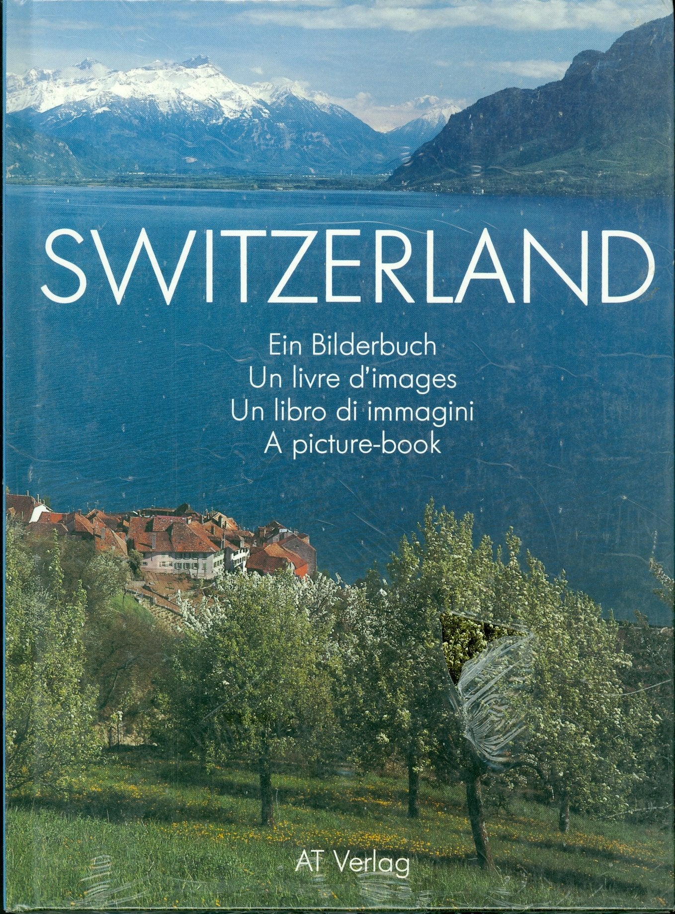 Switzerland: Ein Bilderbuch /Un livre d'images /Un libro di immagini /A picture-book Books