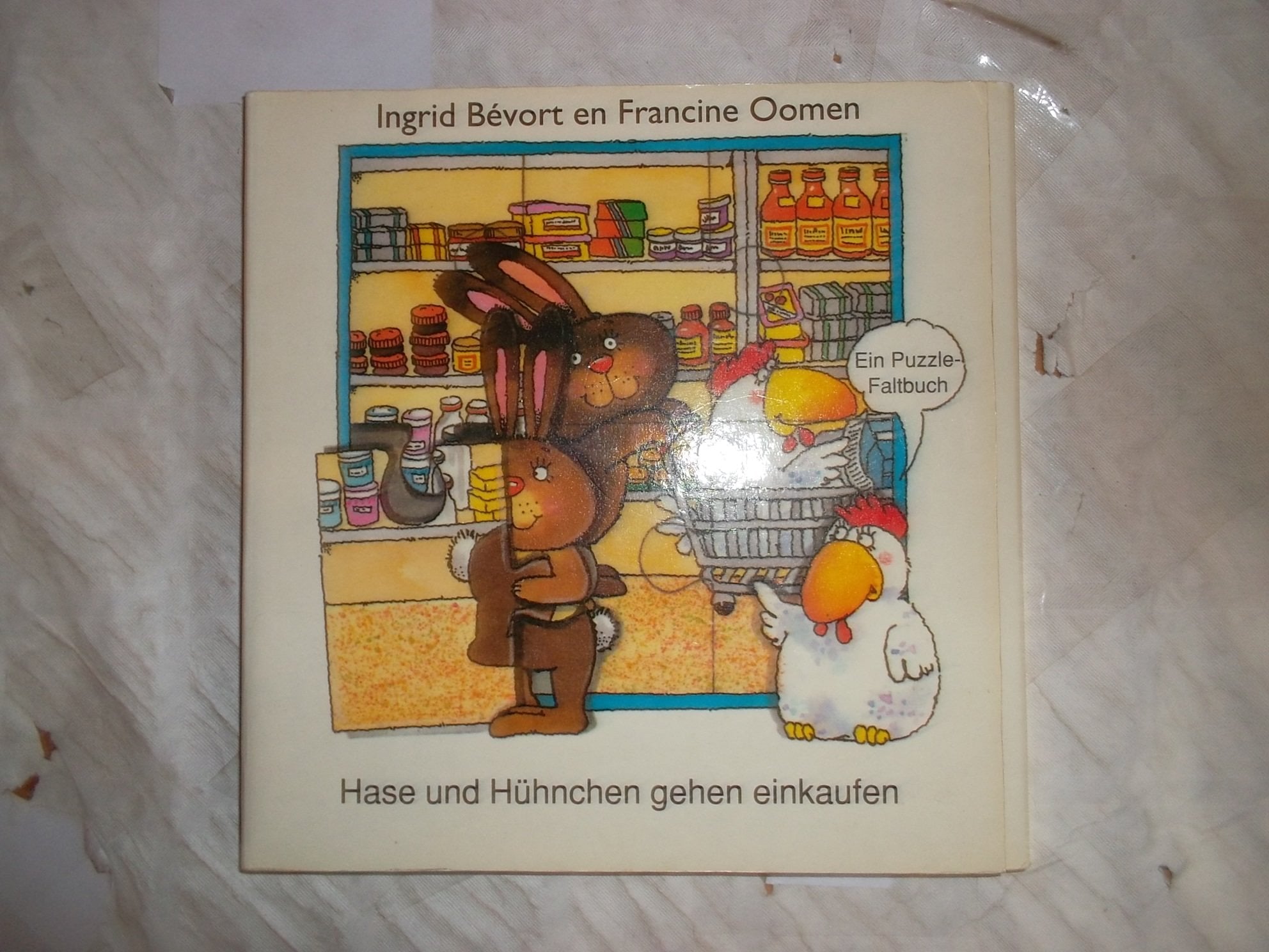 Hase und Hühnchen gehen einkaufen. Ein Puzzle-Faltbuch Books