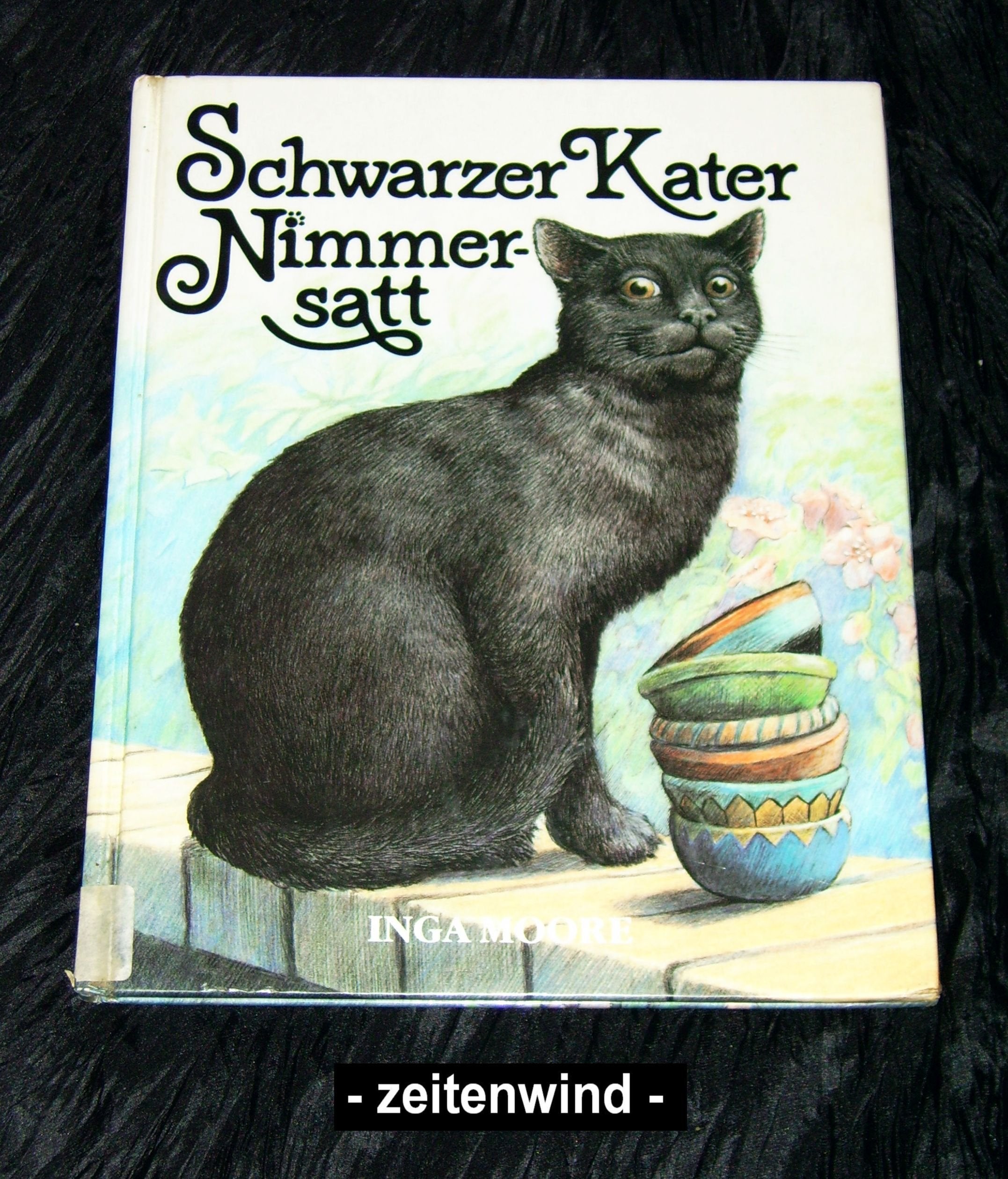 Schwarzer Kater Nimmersatt Books