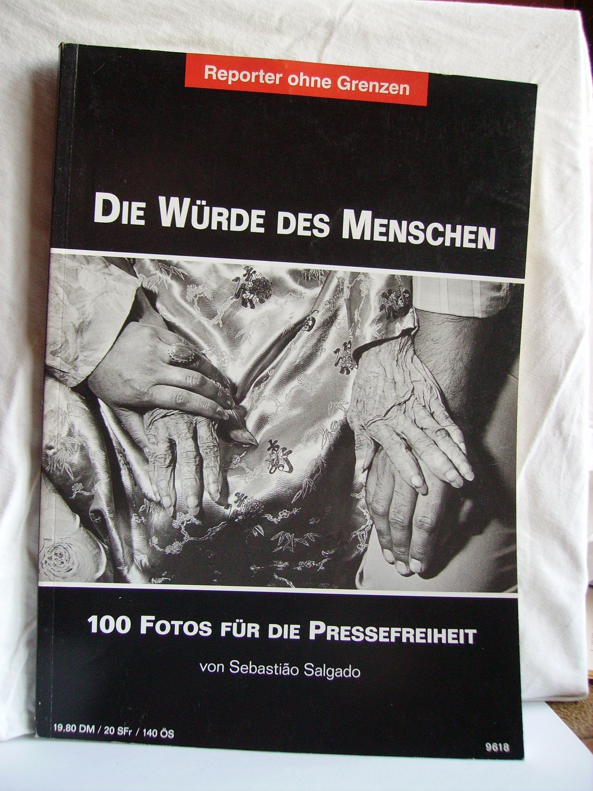 Die Würde des Menschen. 100 Fotos für die Pressefreiheit Law