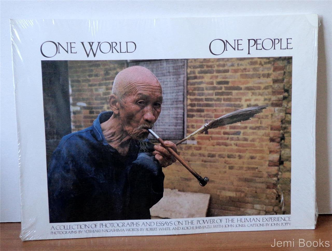 One World, One People: A Collection of Photographs and Essays on the Power of the Human Experience Photography