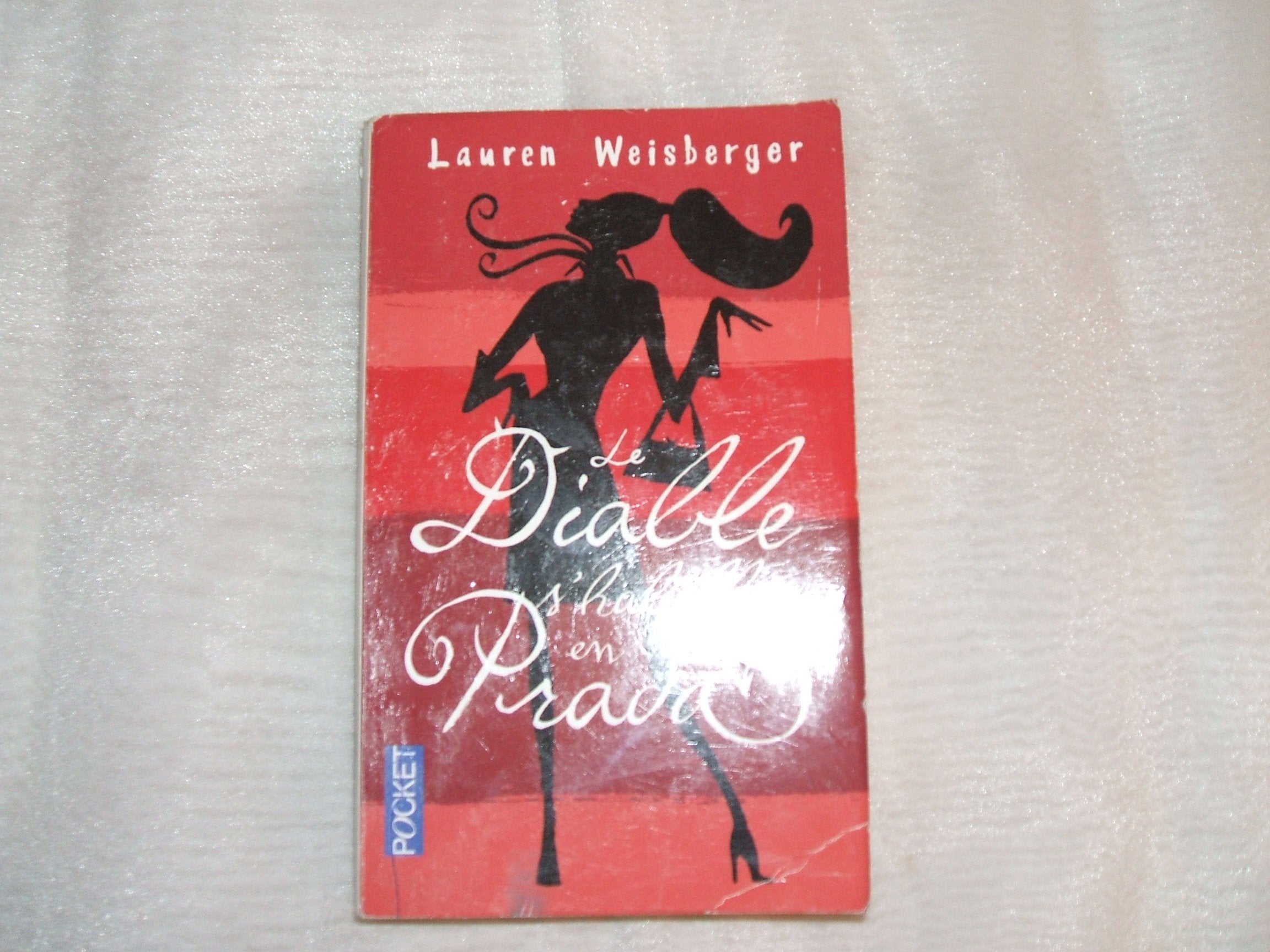 LAUREN WEISBERGER//LE DIABLE S'HABILLE EN PRADA//TRADUIT DE L'AMERICAIN PAR CHRISTINE BARBASTE//FLEUVE NOIR//N°12476//JUILLET 2006 book