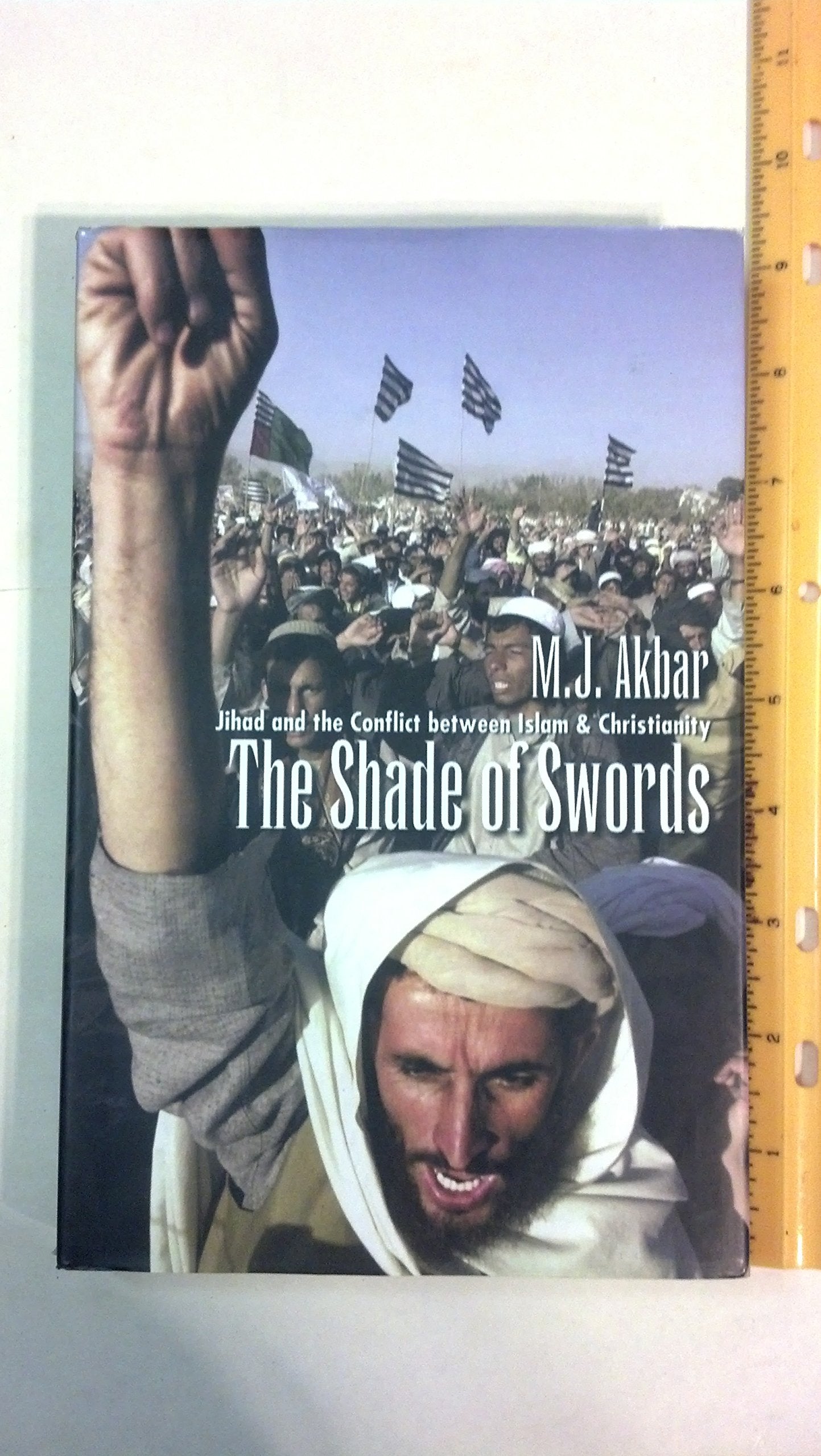 Title: The Shade of Swords Jihad and the conflict between Books