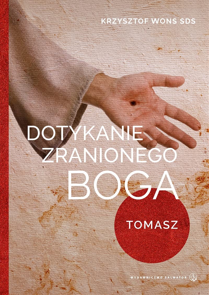 Dotykanie zranionego Boga. Tomasz Books
