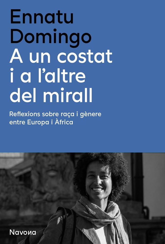 A un costat i a l'altre del mirall Books