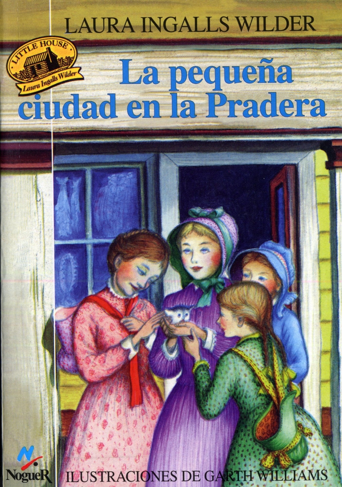 La Pequena Ciudad En La Pradera / Little Town on the Prairie book
