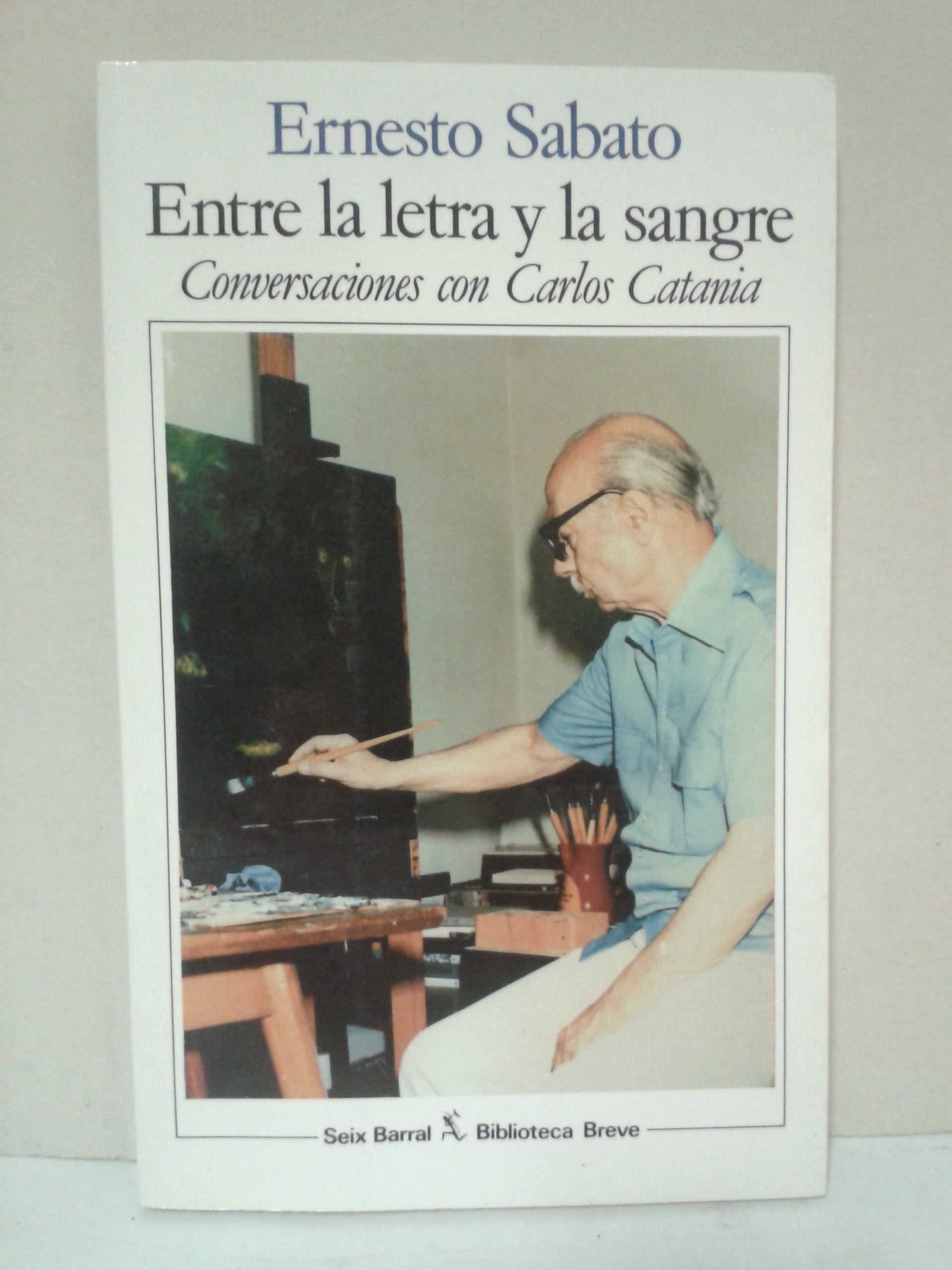 Entre la letra y la sangre: Conversaciones con Carlos Catania book