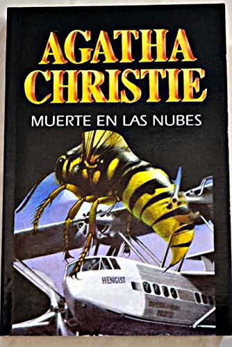 EL HOMBRE DEL TRAJE COLOR CASTAÑO - MUERTE EN LAS NUBES book