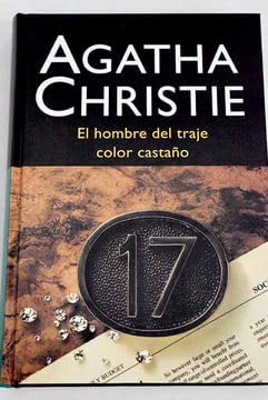 EL HOMBRE DEL TRAJE COLOR CASTAÑO book