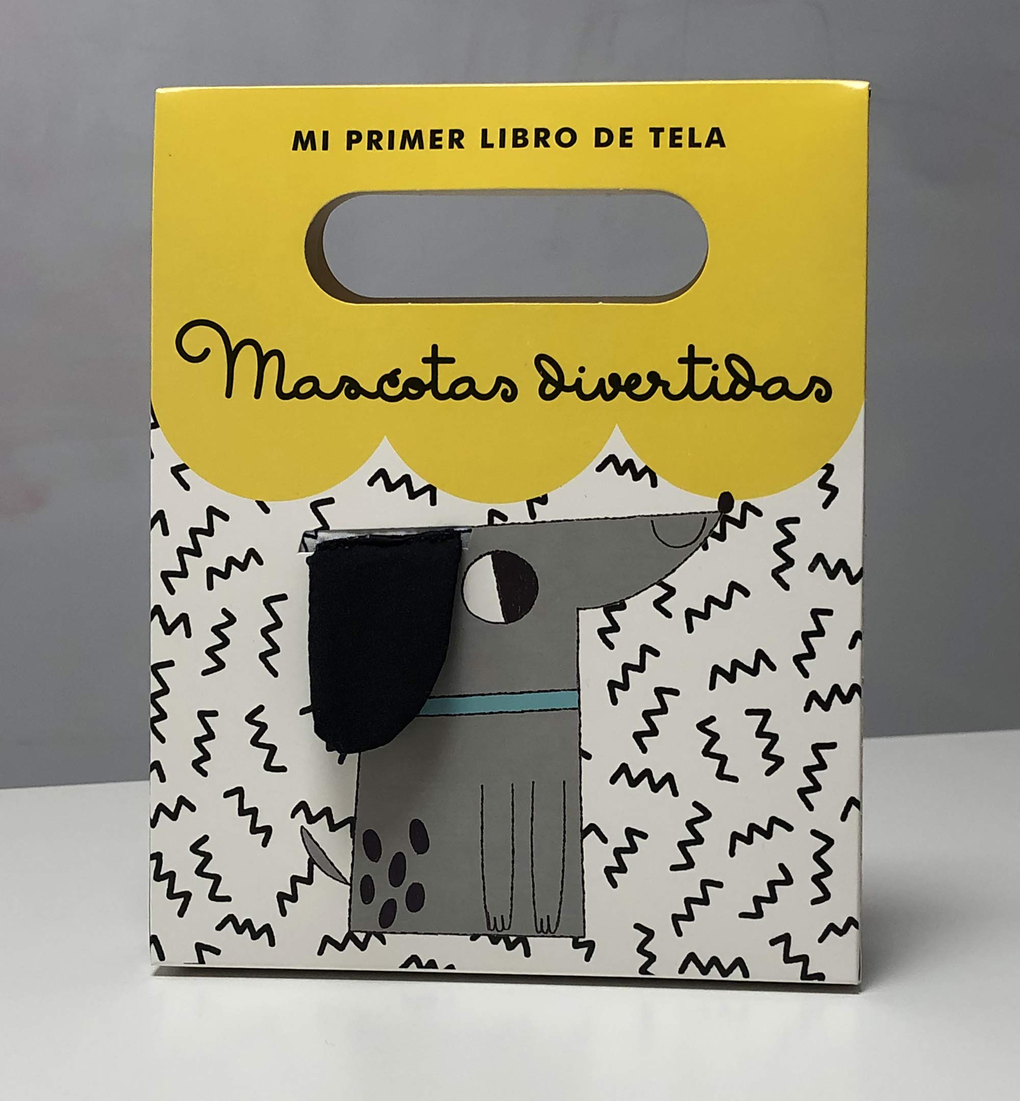 Mascotas divertidas: El primer libro de tela para tu bebé book