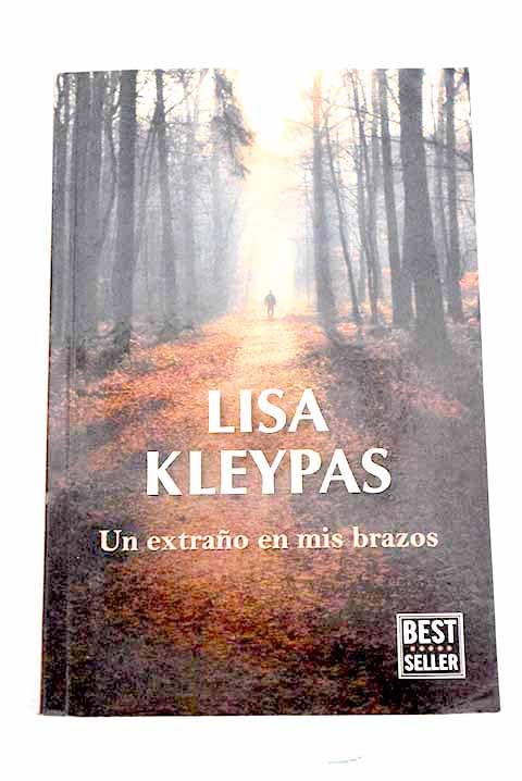 Un extraño en mis brazos Books