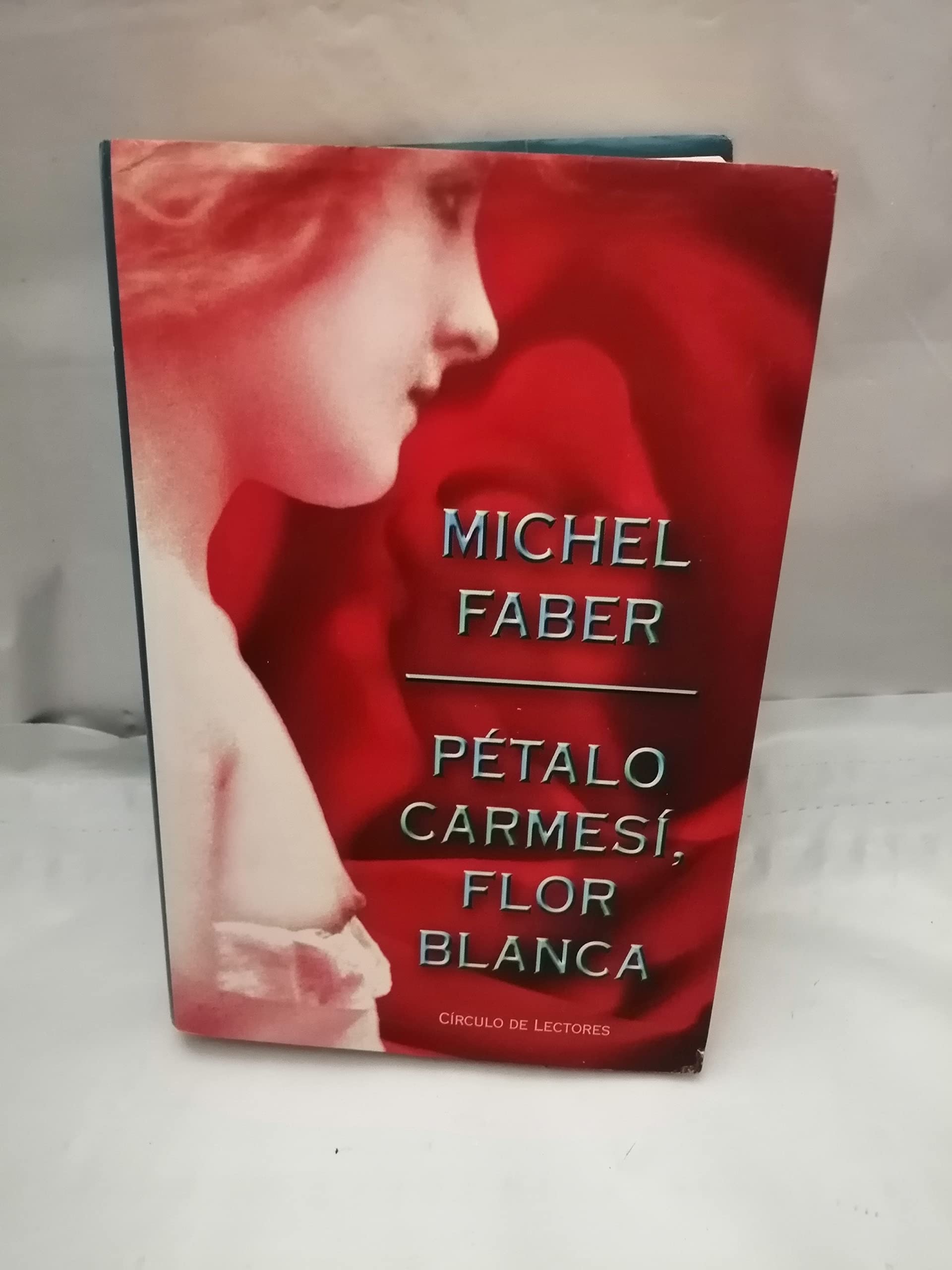 Pétalo carmesí, flor blanca Books