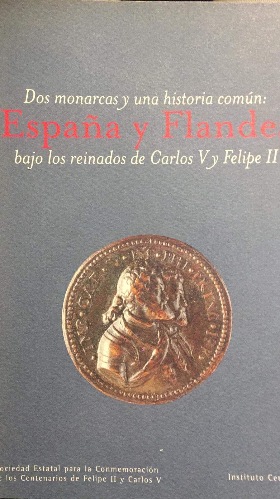 Dos monarcas y una historia en comun: España y flandes bajo los reinados de Carlos y Felipe II book