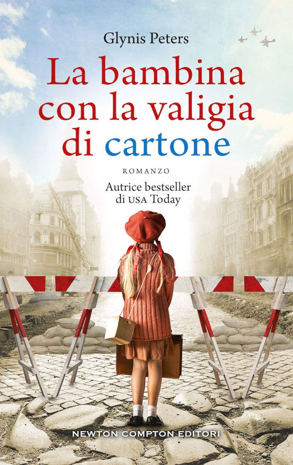 La bambina con la valigia di cartone book