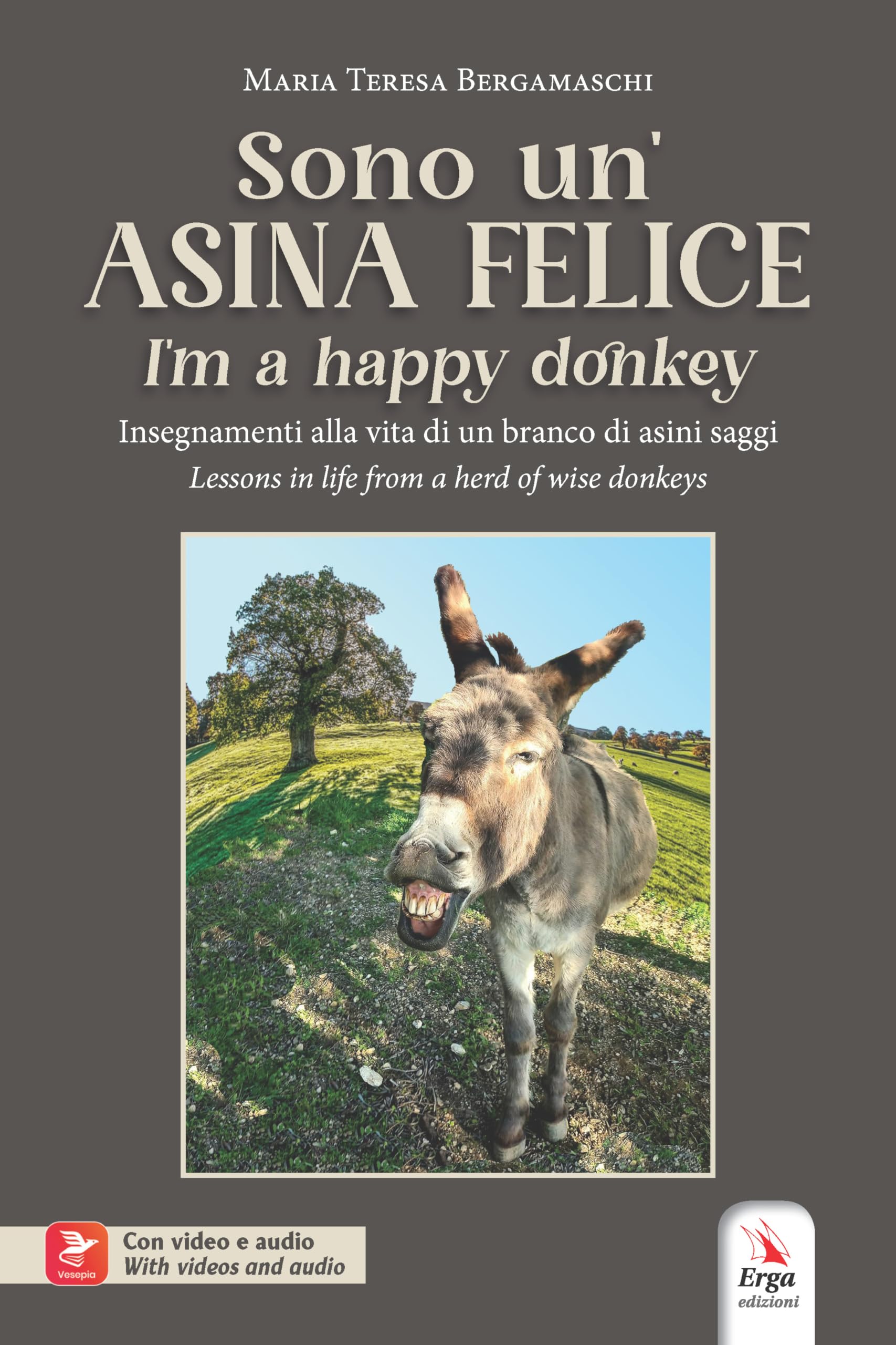 Sono un'asina felice-I'm a happy donkey. Insegnamenti alla vita di un branco di asini saggi-Lessons in life from a herd of wise donkeys. Ediz. bilingue. Con video e audio book