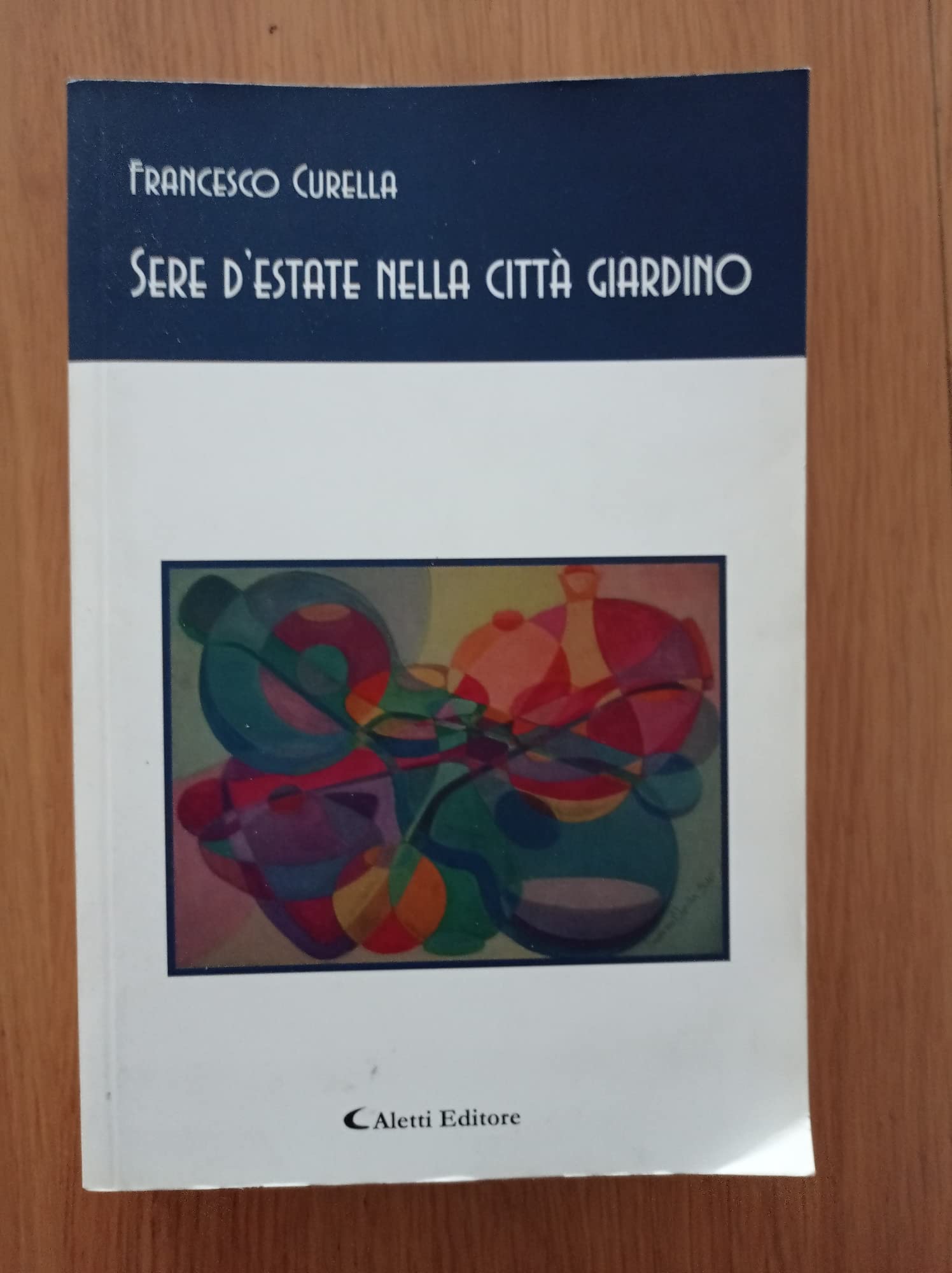 Sere d'estate nella città giardino (Gli emersi poesia) Poetry