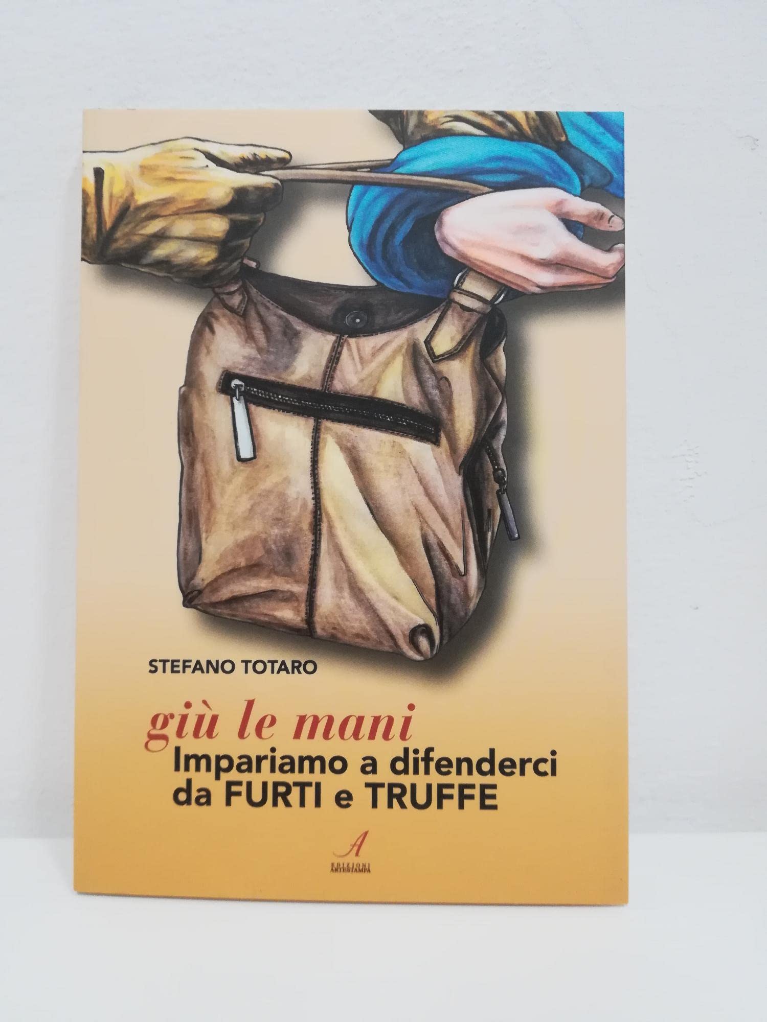 Giù le mani. Impariamo a difenderci da furti e truffe book