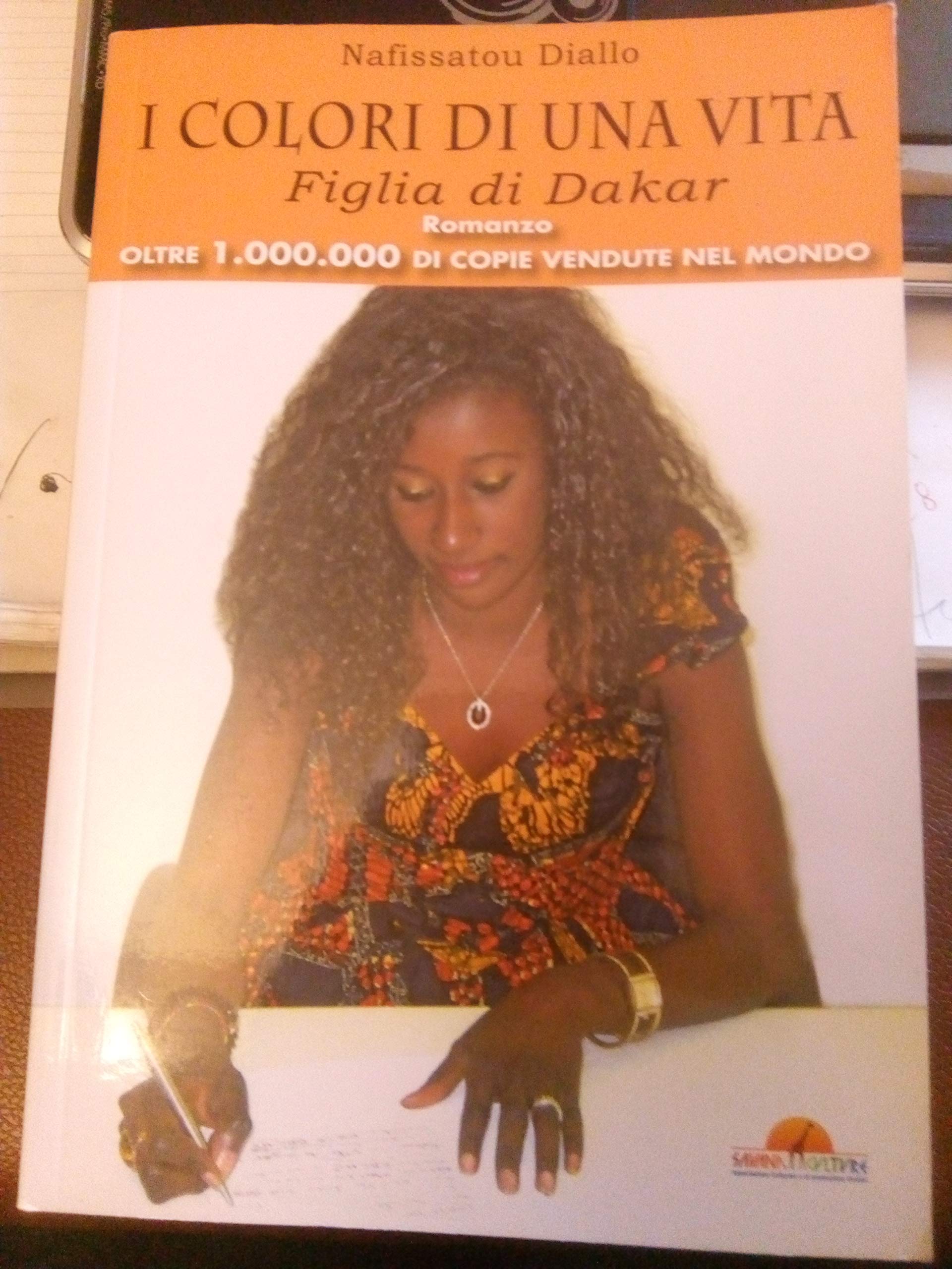 I colori di una vita : figlia di Dakar. Books