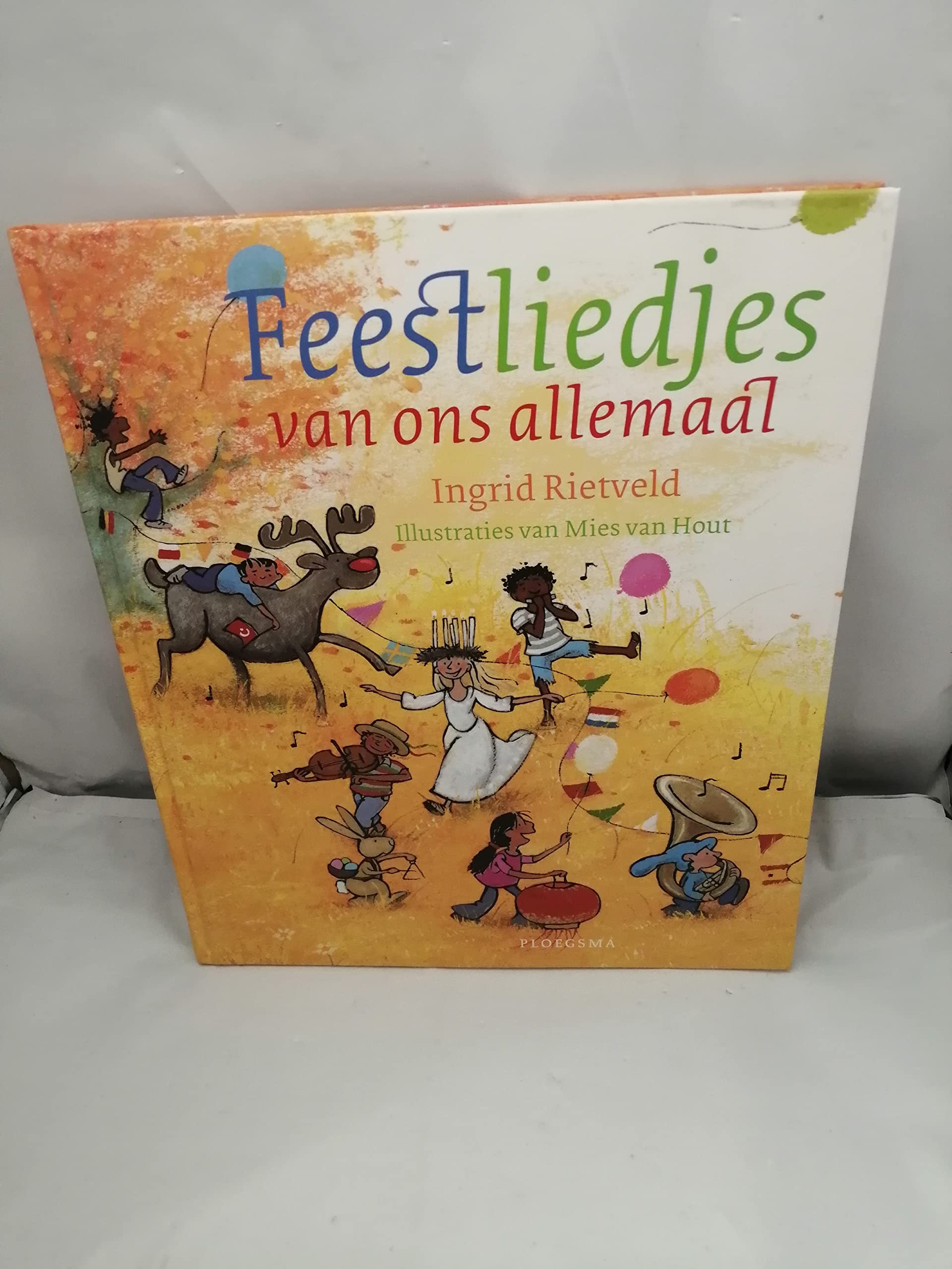 Feestliedjes van ons allemaal: met gitaarbegeleiding book