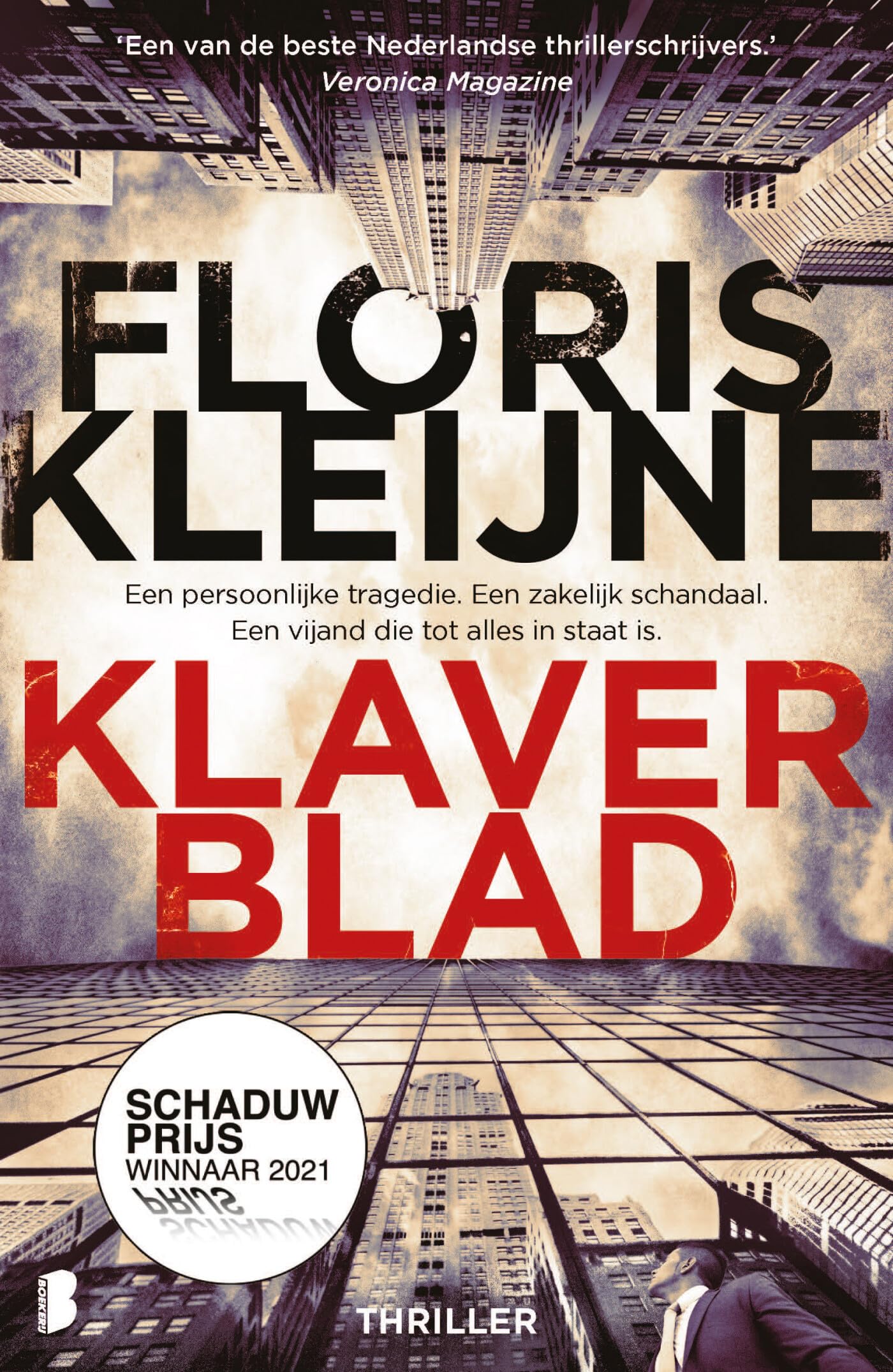 Klaverblad: Een persoonlijke tragedie. Een zakelijk schandaal. Een vijand die tot alles in staat is. Contemporary literature Books