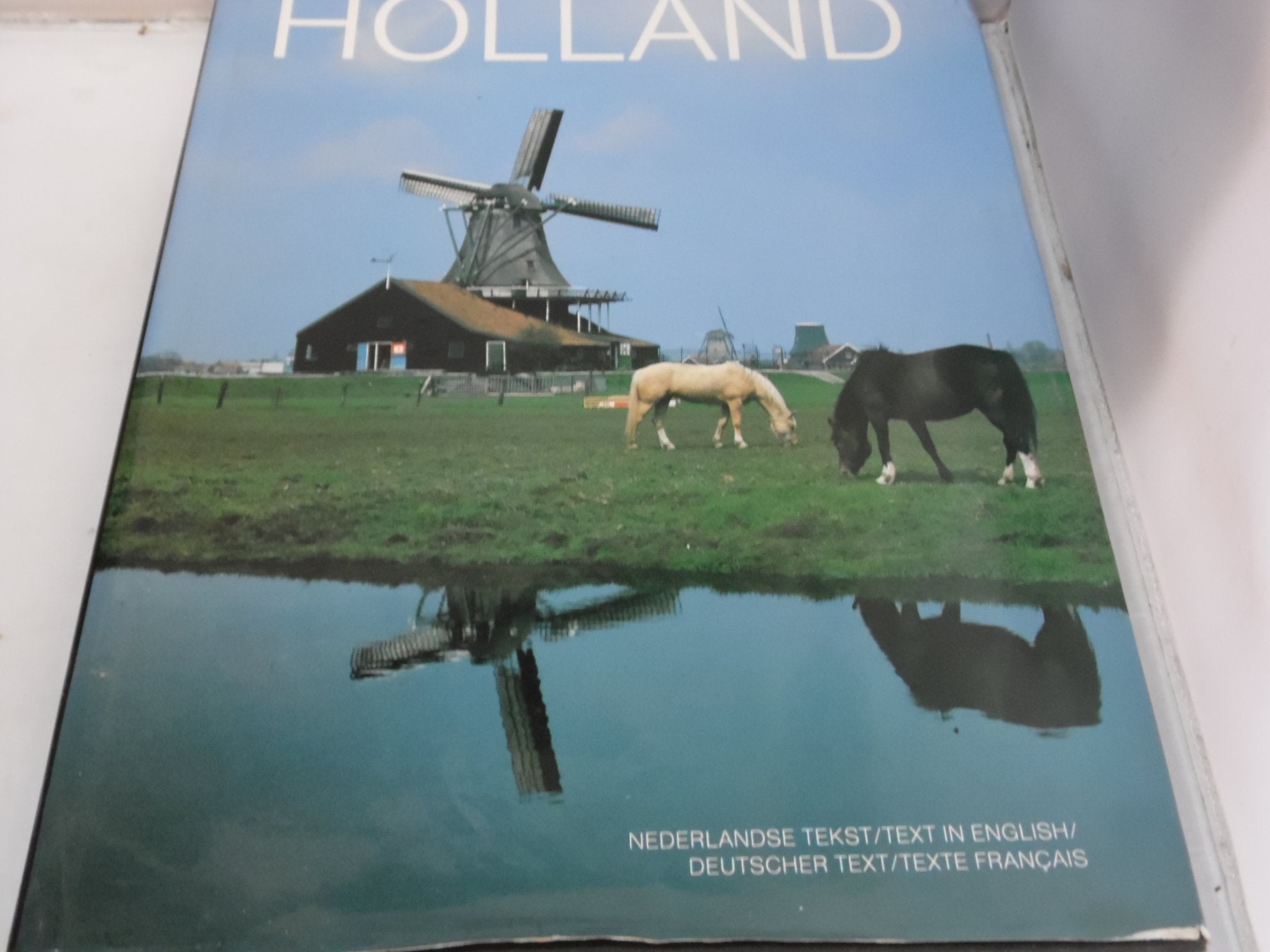 Holland. Nederlandse Tekst - text in English - Deutscher Text - texte francais. Books