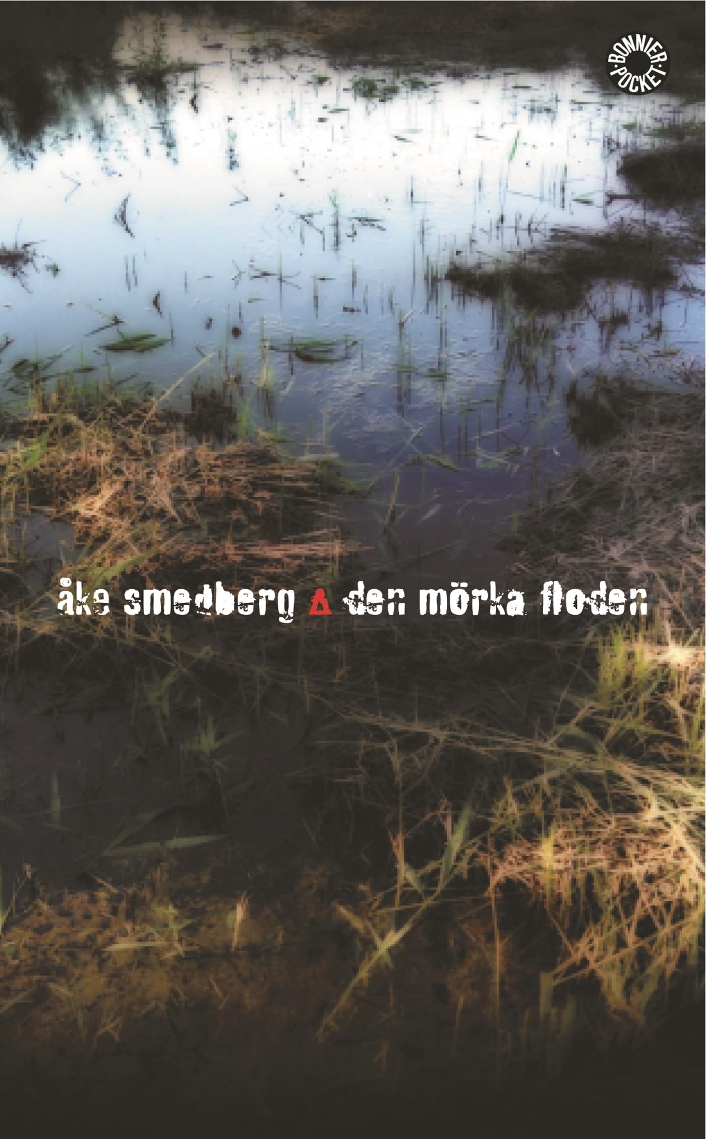 Den mörka floden : kriminalroman (BonnierPocket) Books