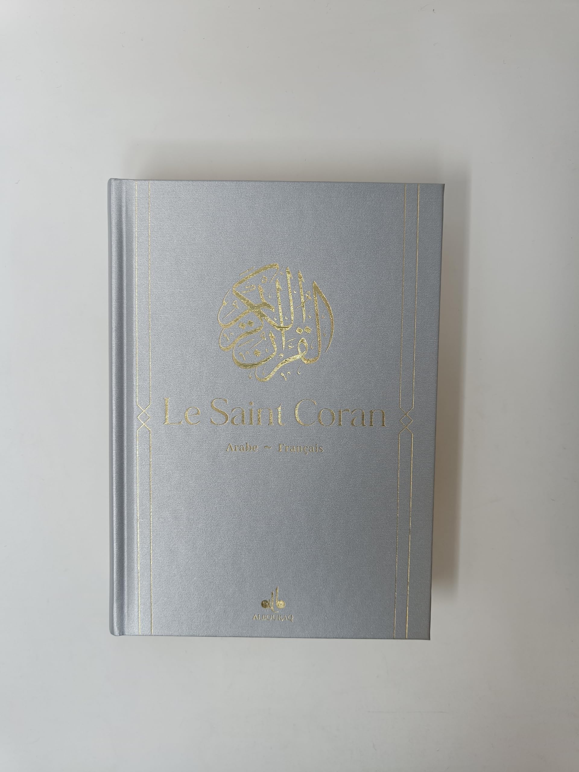 Saint Coran - Bilingue souple (arabe,français) - Moyen (14x20) - Argent book