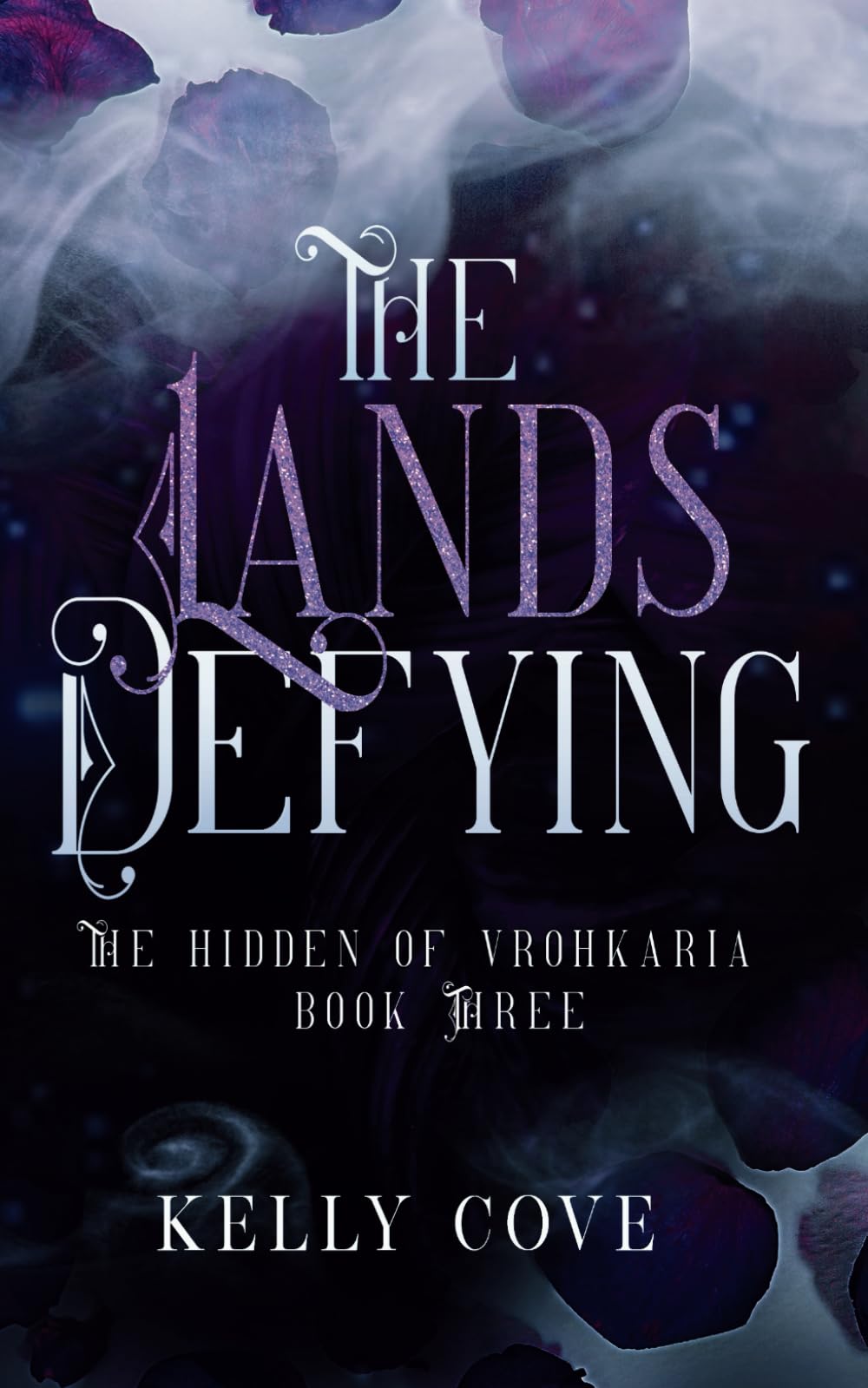 The Lands Defying - A Dark enemies to lovers Fantasy Romance (The Hidden of Vrohkaria Book Three) book
