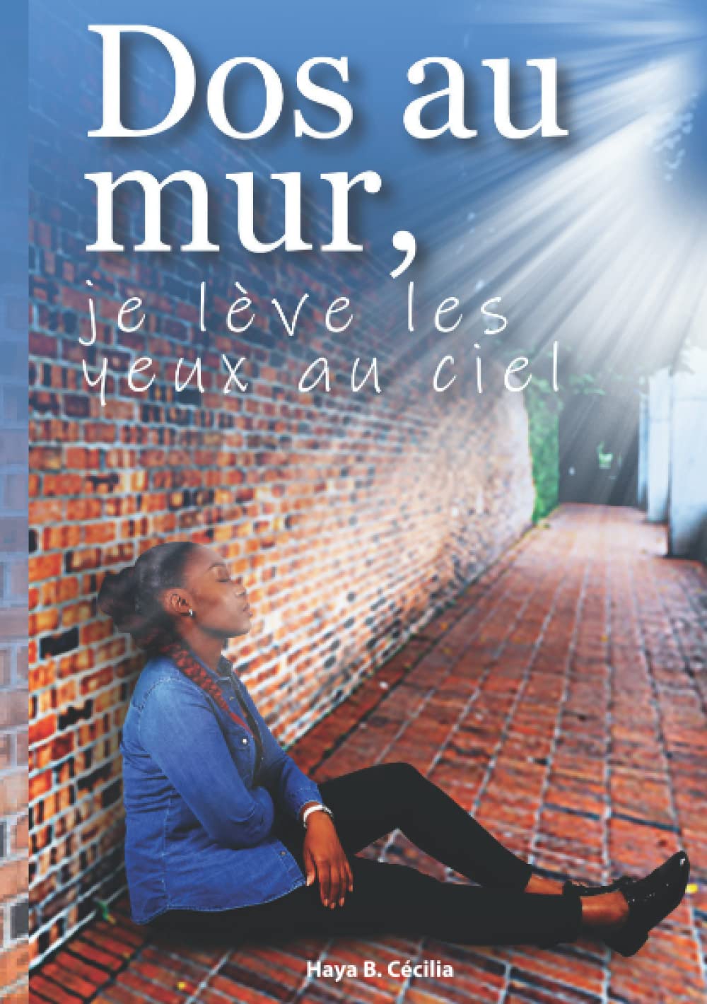 Dos au mur, je lève les yeux au ciel book